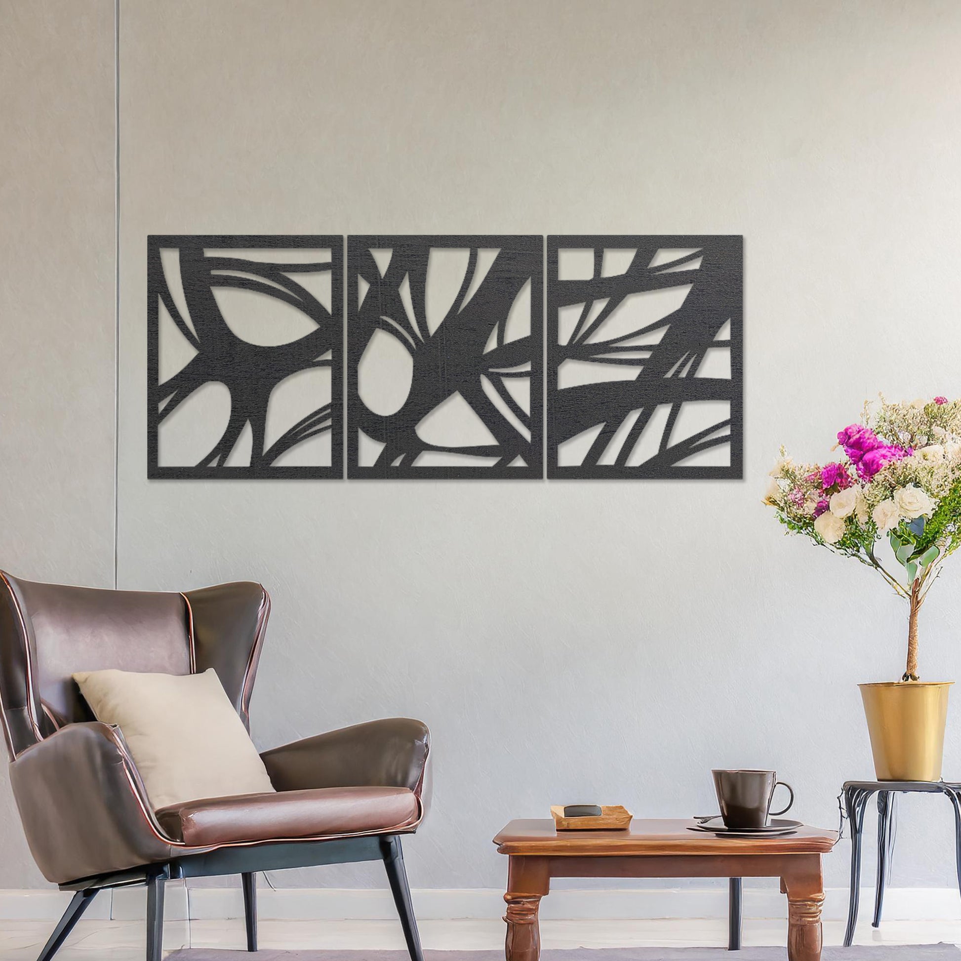 Wooden wall art design featuring a three-panel abstract composition with flowing, organic shapes and cutouts, placed on a neutral wall within modern room decor. The design blends dynamic movement and minimalism for a contemporary look.