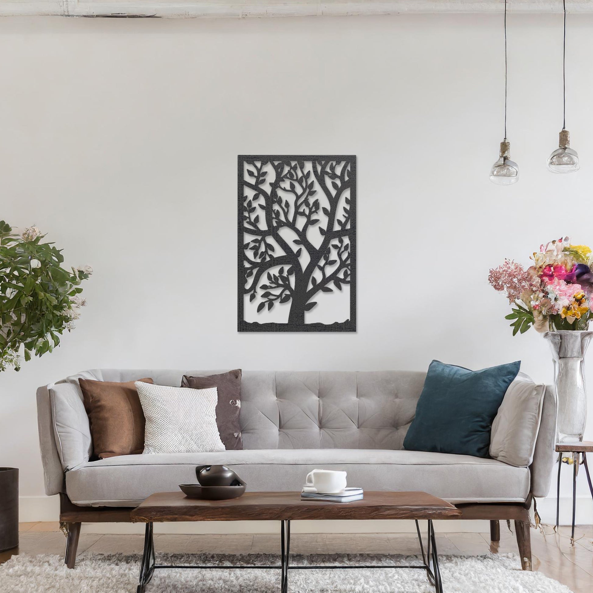 Wooden wall art featuring a rectangular design with an intricate tree motif, showcasing detailed branches and leaves. The artwork is displayed on a neutral wall within modern room decor, highlighting its natural elegance.