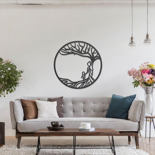 Wooden wall art featuring a circular design with a tree and two human figures under its branches, symbolising family and connection. The artwork is displayed on a neutral wall within modern room decor, highlighting its meaningful design.