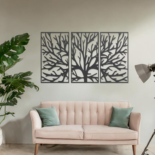 Wall art featuring an intricate tree branch design split into three panels. The piece is displayed on a neutral wall within modern room decor, complementing the surrounding contemporary setting.
