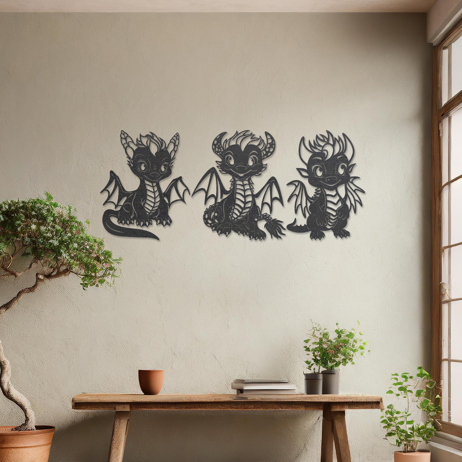 Wooden wall art design featuring three playful dragon characters, each with different poses and expressions, placed on a neutral wall within modern room decor. The design brings whimsy and charm with detailed features and lively energy.