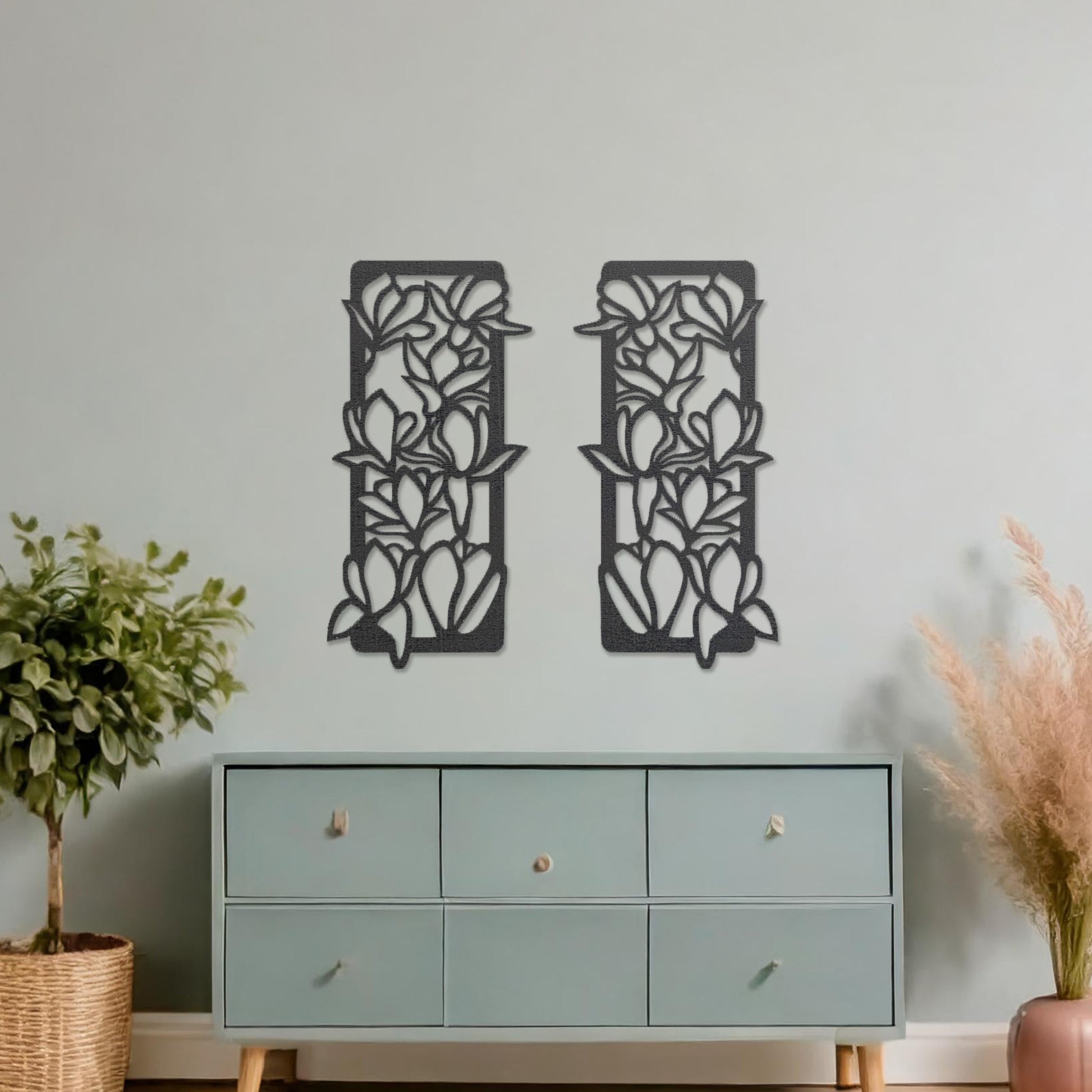 Wooden wall art featuring two rectangular panels with a floral vine design, displayed on a neutral wall within modern room decor, highlighting its elegant and nature-inspired craftsmanship.