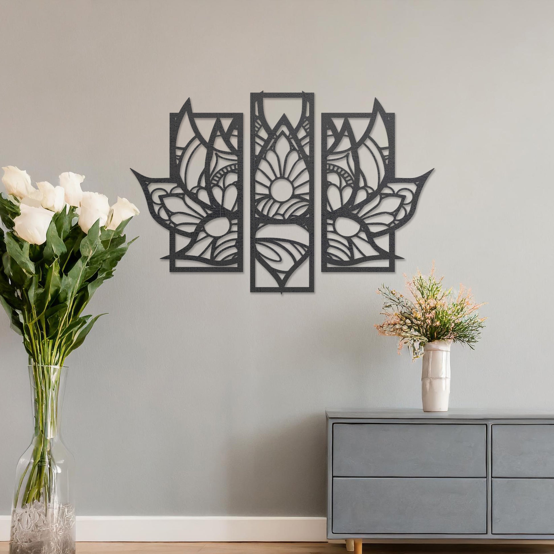 Wall art featuring a lotus-inspired floral design in three distinct panels with intricate geometric patterns. The piece is mounted on a neutral wall within modern room decor, adding elegance to the space.
