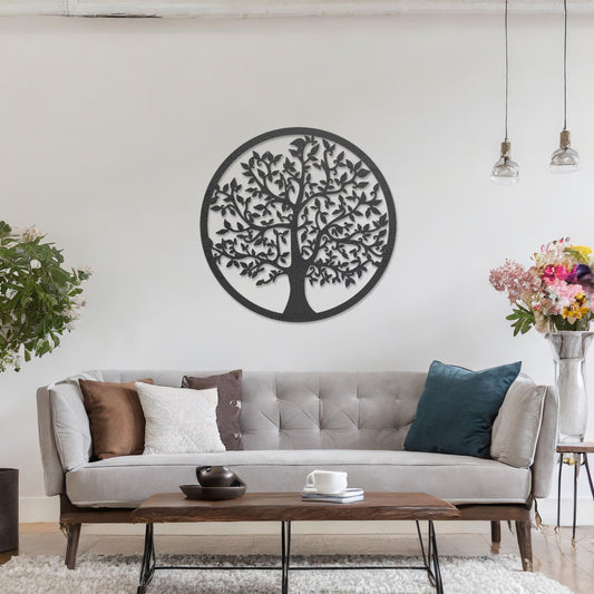 Wooden wall art featuring a circular design with an intricately detailed tree of life motif. The artwork is displayed on a neutral wall within modern room decor, highlighting its symbolic and artistic appeal.