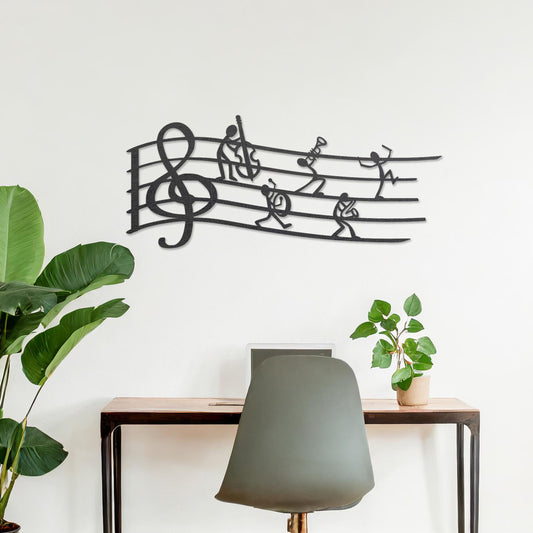 Wall art featuring a creative design of a musical staff with a treble clef and stick figures playing instruments, adding a whimsical and artistic touch. The piece is displayed on a neutral wall within modern decor, enhancing the space with musical charm.
