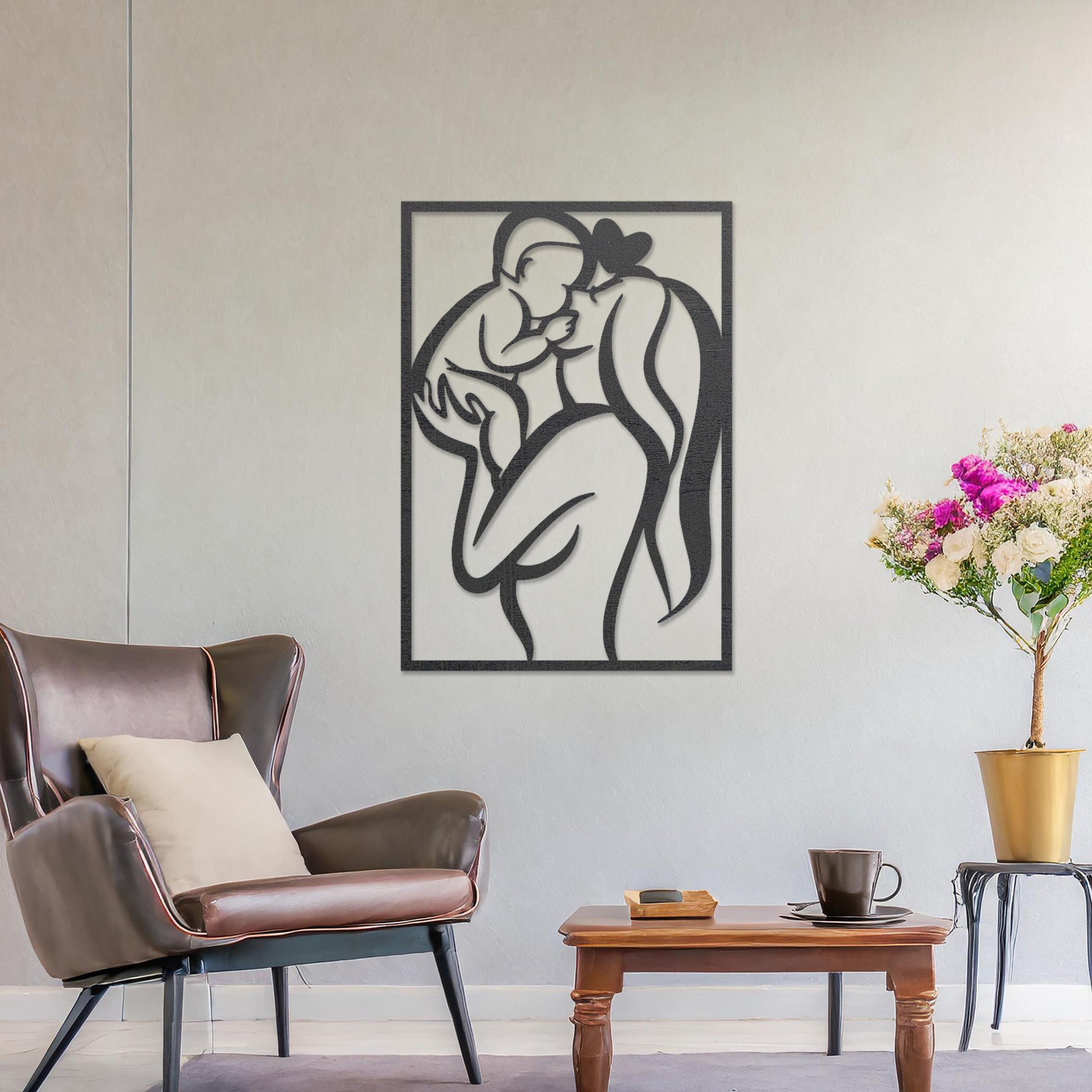 Wooden wall art featuring a rectangular design depicting a mother holding her baby in an abstract and heartfelt style. The artwork is displayed on a neutral wall within modern room decor, highlighting its emotional and artistic essence.