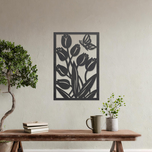 Wooden wall art design featuring tulips with a butterfly, framed in a rectangular shape, placed on a neutral wall within modern room decor. The design captures the beauty of nature with detailed plant and insect motifs.