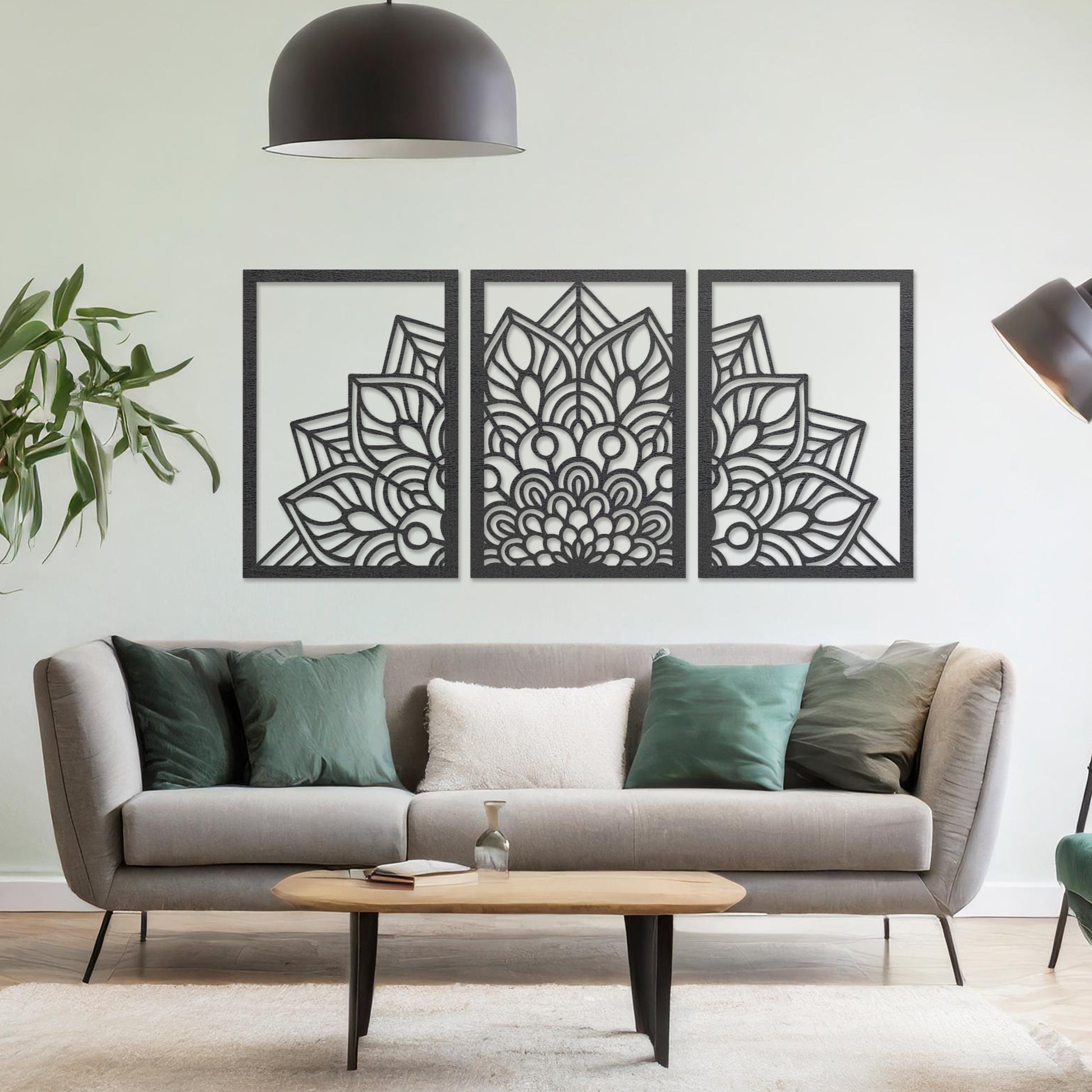 Wall art featuring a triptych design with an intricate mandala pattern spread across three panels. The artwork is displayed on a neutral wall within modern room decor, adding a harmonious and decorative touch to the setting.