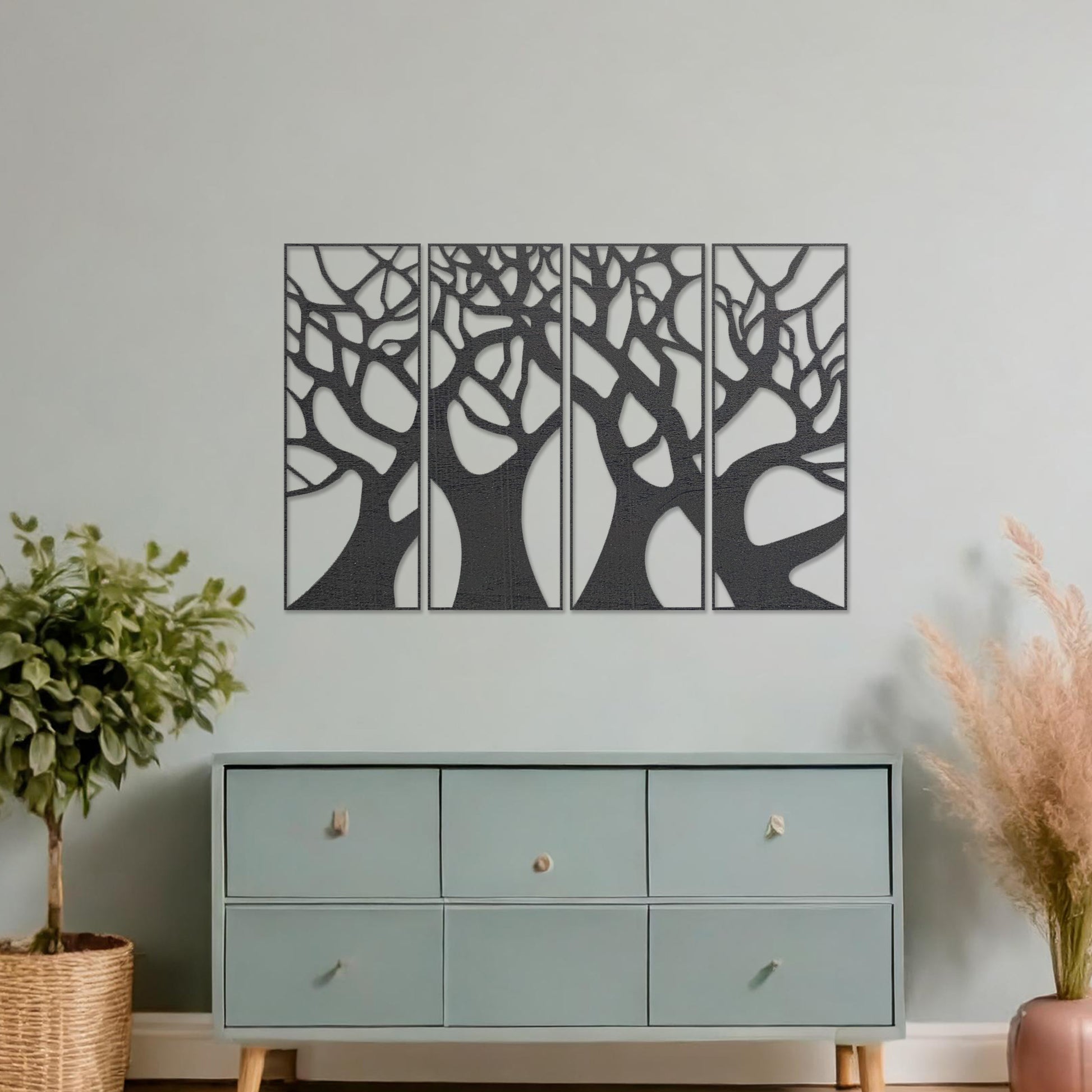 Wooden wall art featuring a set of four panels with an abstract tree design, showcasing interwoven trunks and branches, displayed on a neutral wall within modern room decor, highlighting its intricate and artistic craftsmanship.