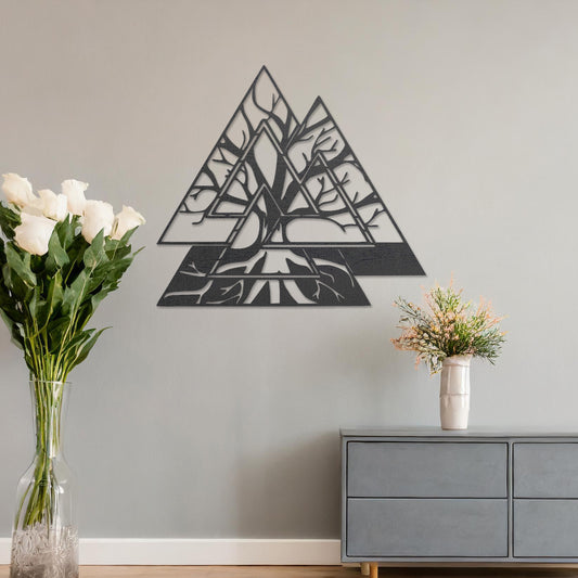 Wooden wall art design featuring a geometric triangular shape with intricate tree branches interwoven inside, placed on a neutral wall within modern room decor. The design combines nature and geometry for a contemporary, artistic expression.