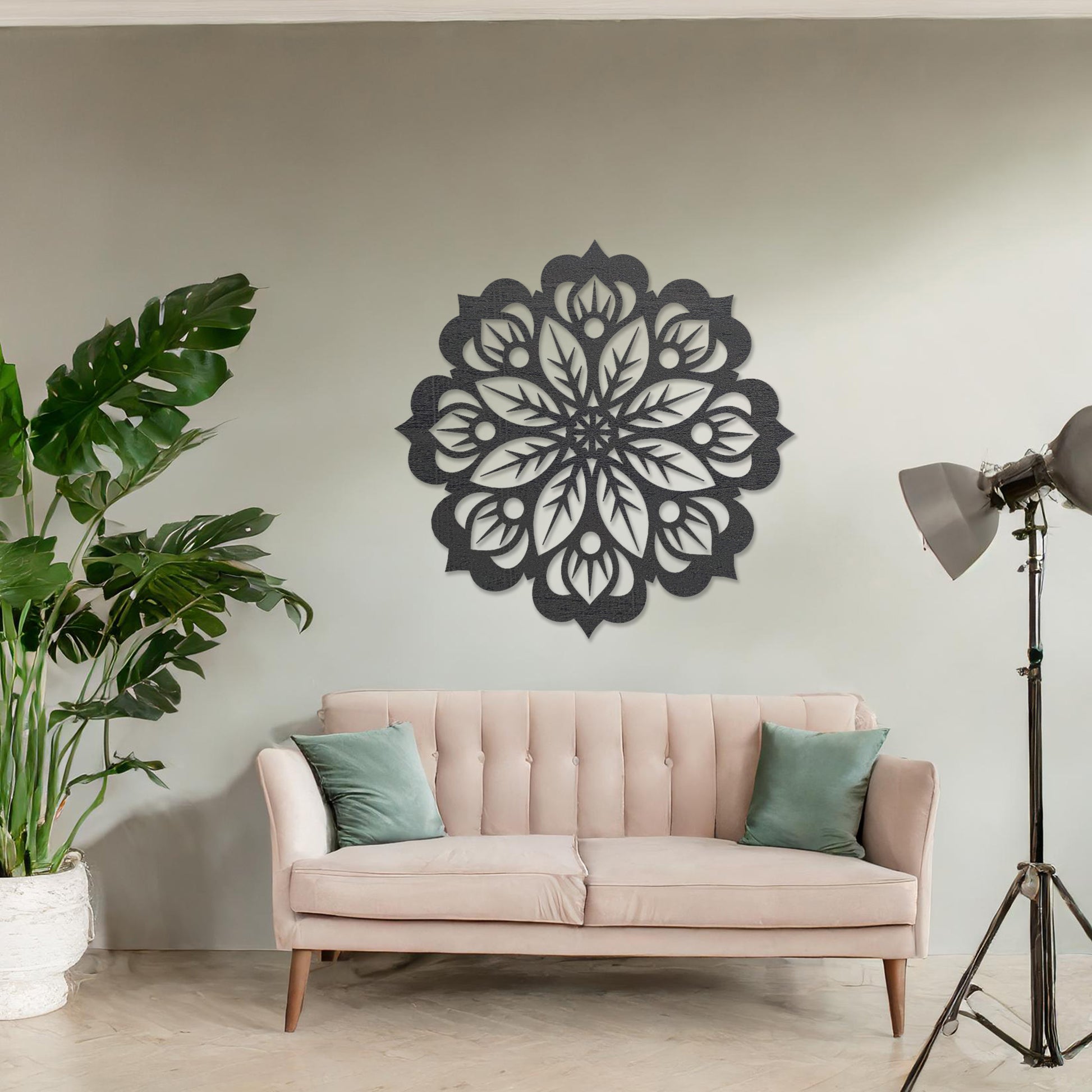 Wooden wall art featuring a circular mandala design with intricate floral and geometric patterns. The artwork is displayed on a neutral wall within modern room decor, highlighting its artistic and symmetrical elegance.