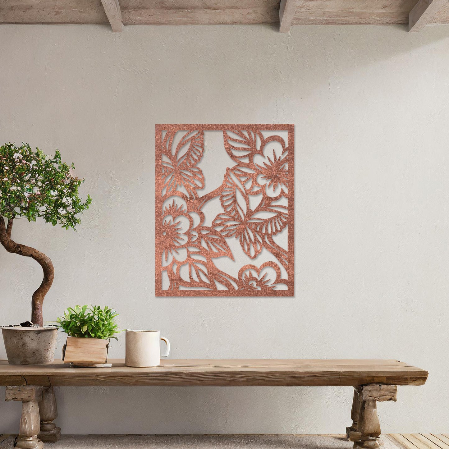Wooden wall art featuring a square design with intricate floral and leaf patterns, showcasing a vibrant natural theme. The artwork is displayed on a neutral wall within modern room decor, highlighting its artistic and elegant appeal.