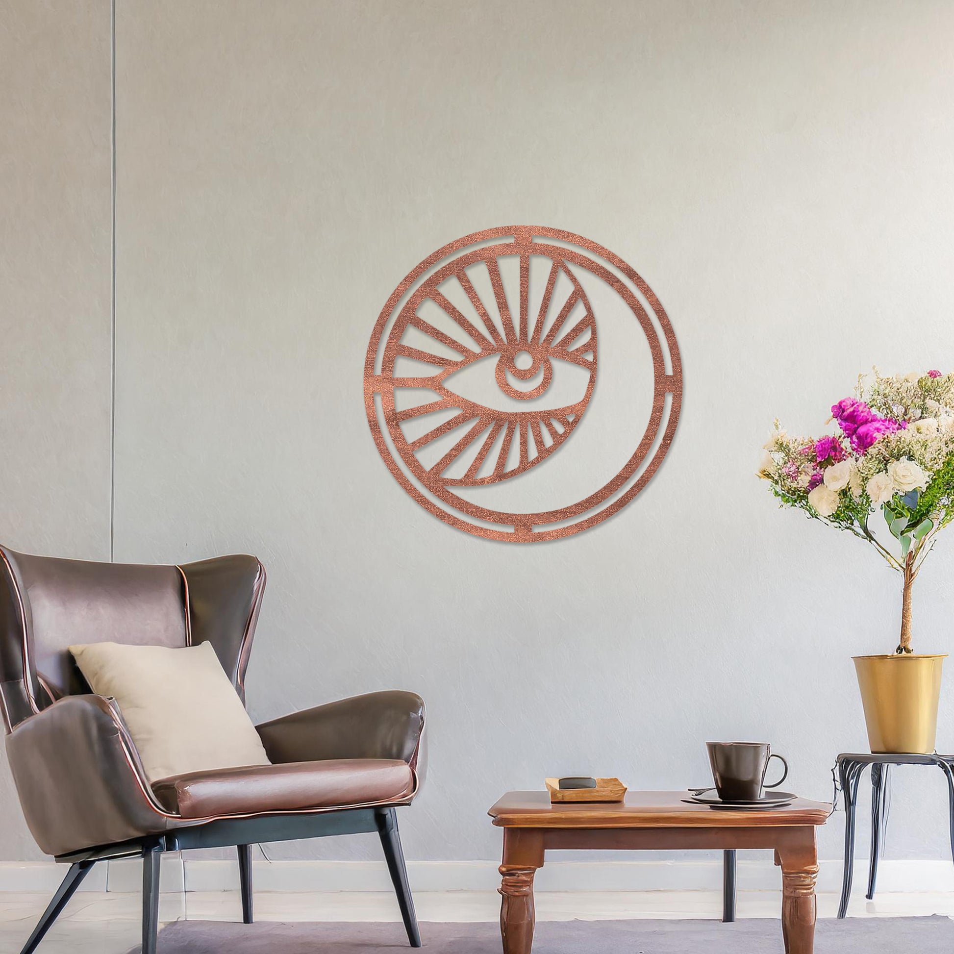 Wooden wall art featuring a circular design with an eye motif and geometric patterns radiating outward. The artwork is displayed on a neutral wall within modern room decor, highlighting its bold and contemporary aesthetic.