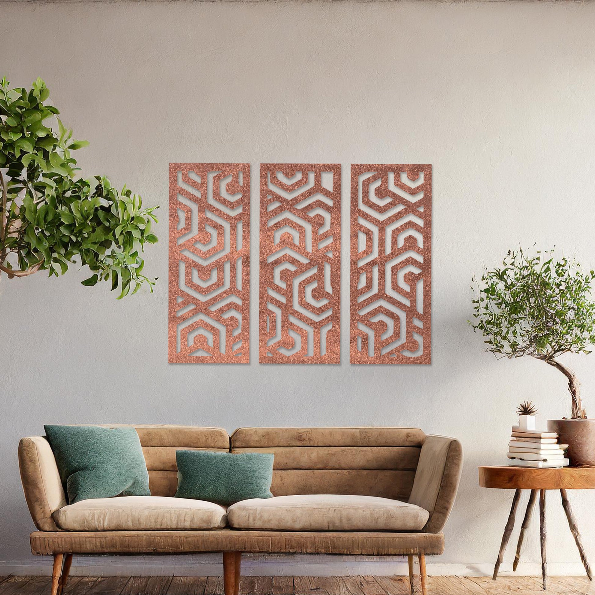 Wooden wall art featuring a three-panel design with intricate geometric patterns. The artwork is displayed on a neutral wall within modern room decor, highlighting its bold and symmetrical design.