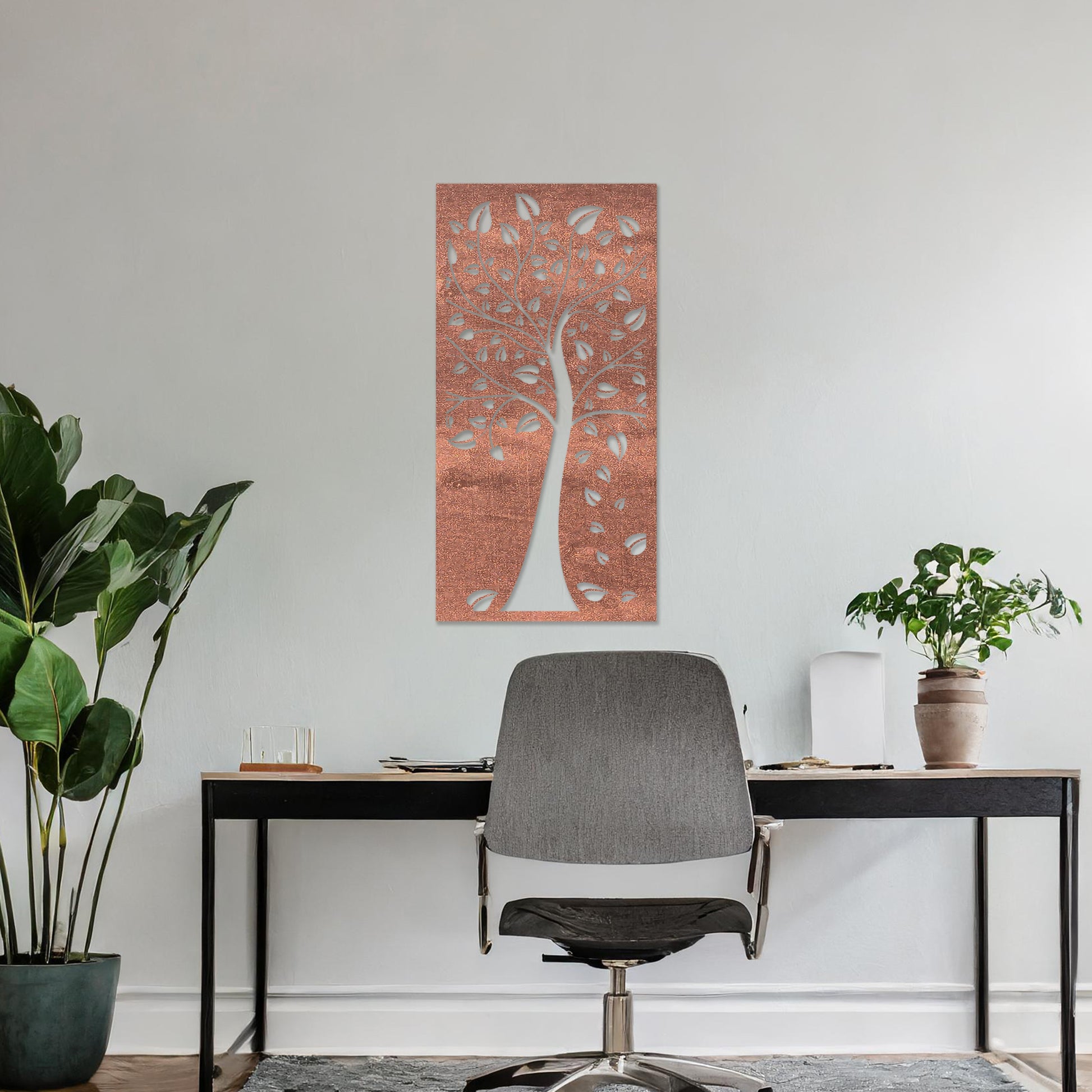 This design showcases a stylized tree with intricate branches and falling leaves, all within a vertical frame. The delicate detailing evokes natural beauty, adding an elegant touch to any modern room.