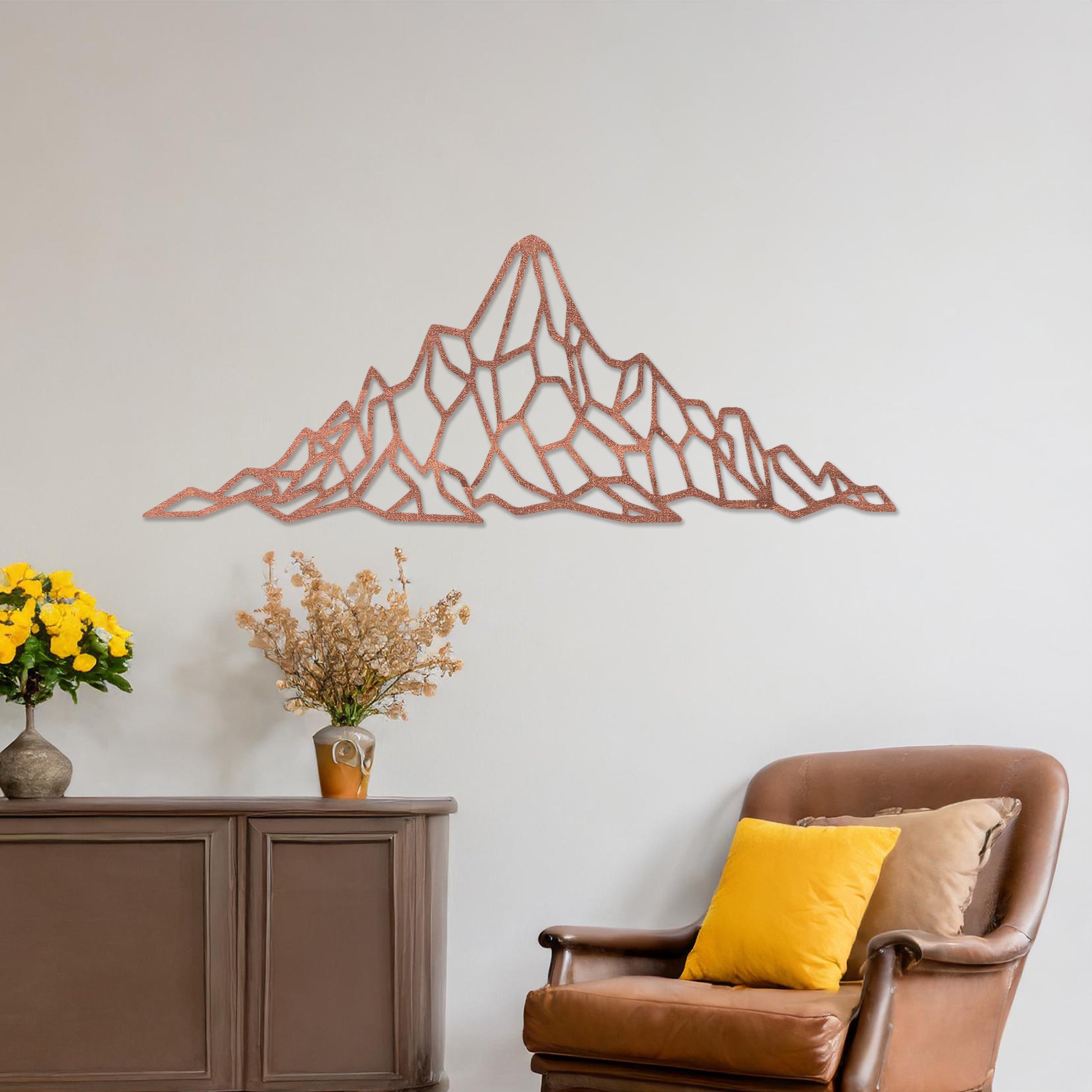 Wooden wall art featuring a geometric mountain range design with angular, interconnected shapes. The artwork is displayed on a neutral wall within modern room decor, emphasising its bold and minimalist aesthetic.