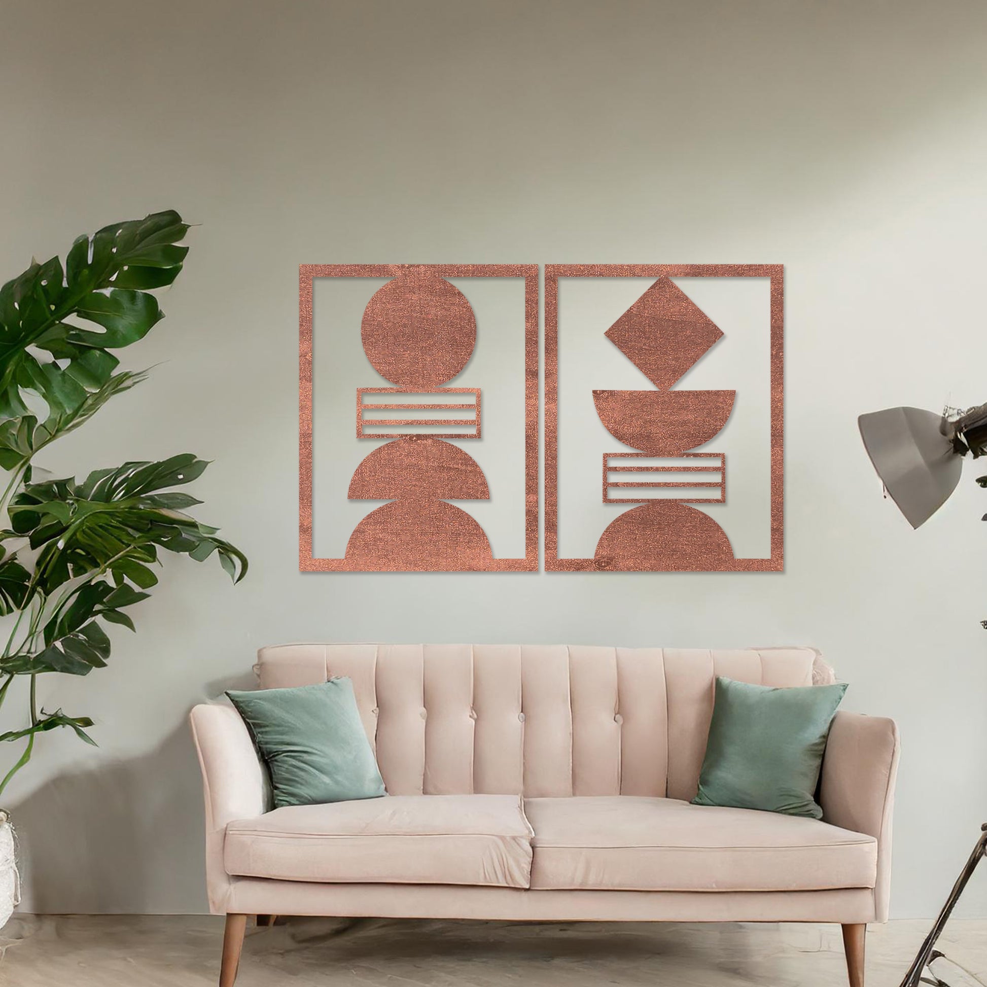 Wall art featuring a set of two geometric abstract designs, each framed with symmetrical shapes and minimalist patterns. The pieces are displayed on a neutral wall within modern room decor, enhancing the contemporary aesthetic.