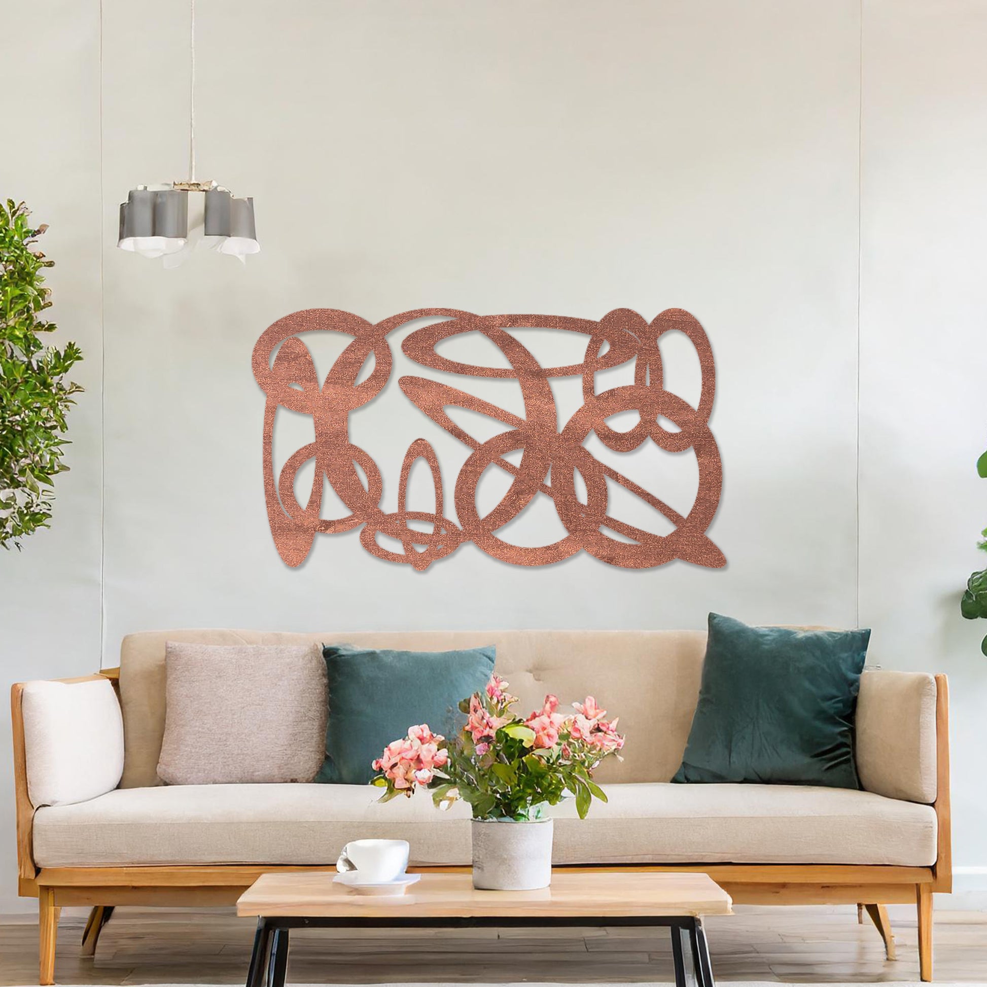 Wooden wall art design featuring an abstract composition of interwoven loops and shapes, placed on a neutral wall within modern room decor. The design combines flowing lines and organic forms for a contemporary, artistic feel.