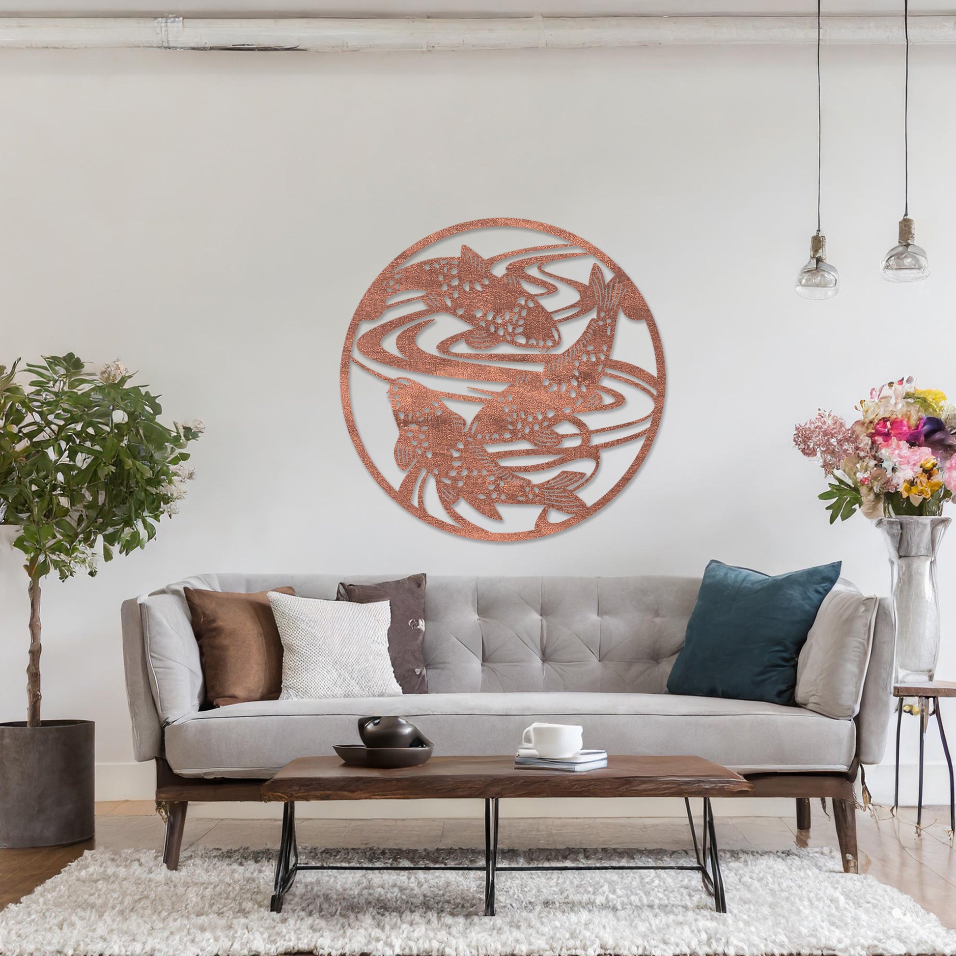 Wooden wall art design featuring koi fish swimming in circular patterns, framed in a round shape, placed on a neutral wall within modern room decor. The design evokes tranquility and movement with its elegant depiction of nature.
