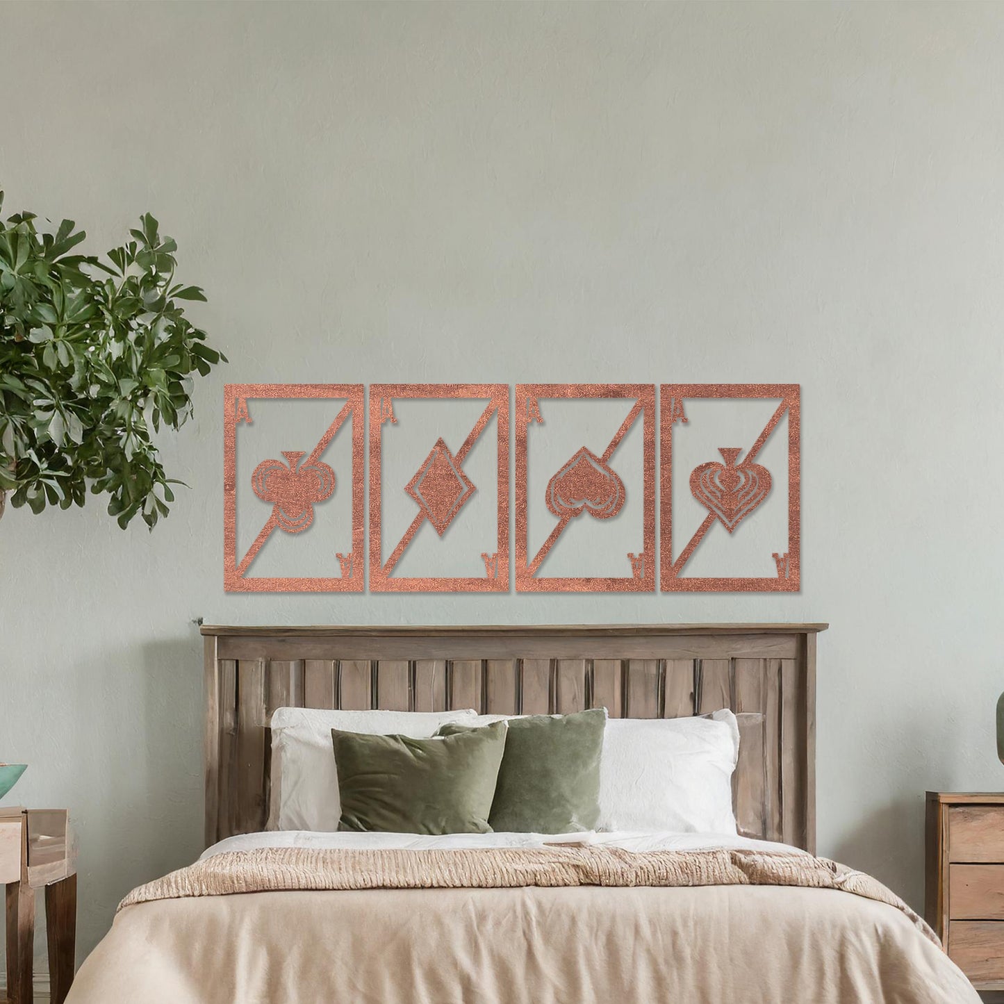 Wooden wall art featuring a set of four panels with playing card ace designs, each showcasing a club, diamond, heart, and spade symbol, displayed on a neutral wall within modern room decor, highlighting its bold and creative craftsmanship.
