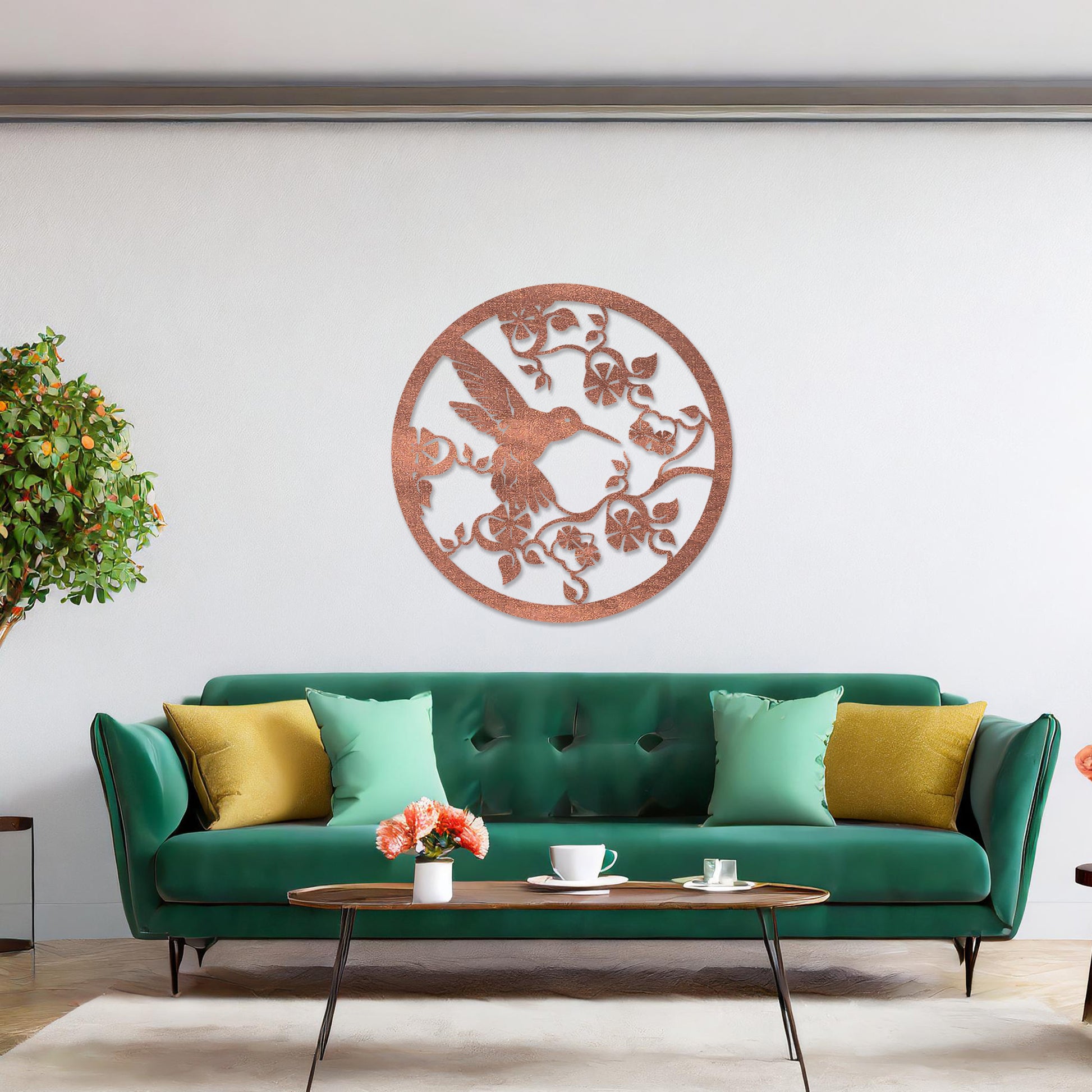 Wooden wall art design featuring a hummingbird amidst flowers and vines, framed in a circular shape, placed on a neutral wall within modern room decor. The design captures the elegance of nature with intricate details.