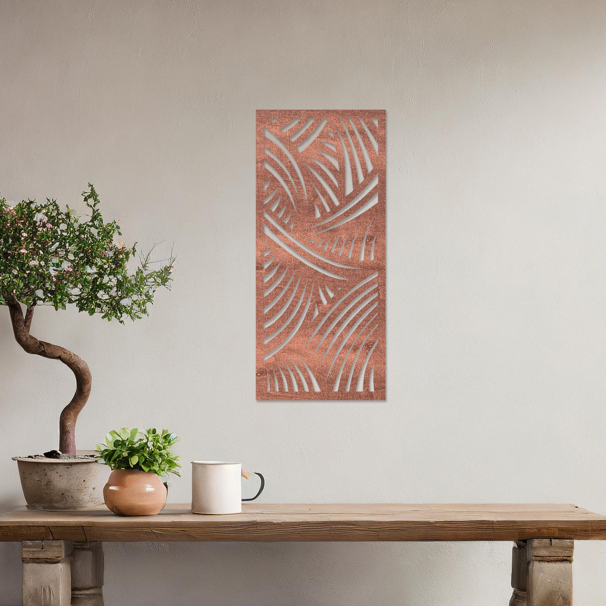 Wall art featuring an abstract design with intersecting curved lines creating a dynamic pattern. The piece is displayed on a neutral wall within modern decor, adding a bold and artistic statement to the space.