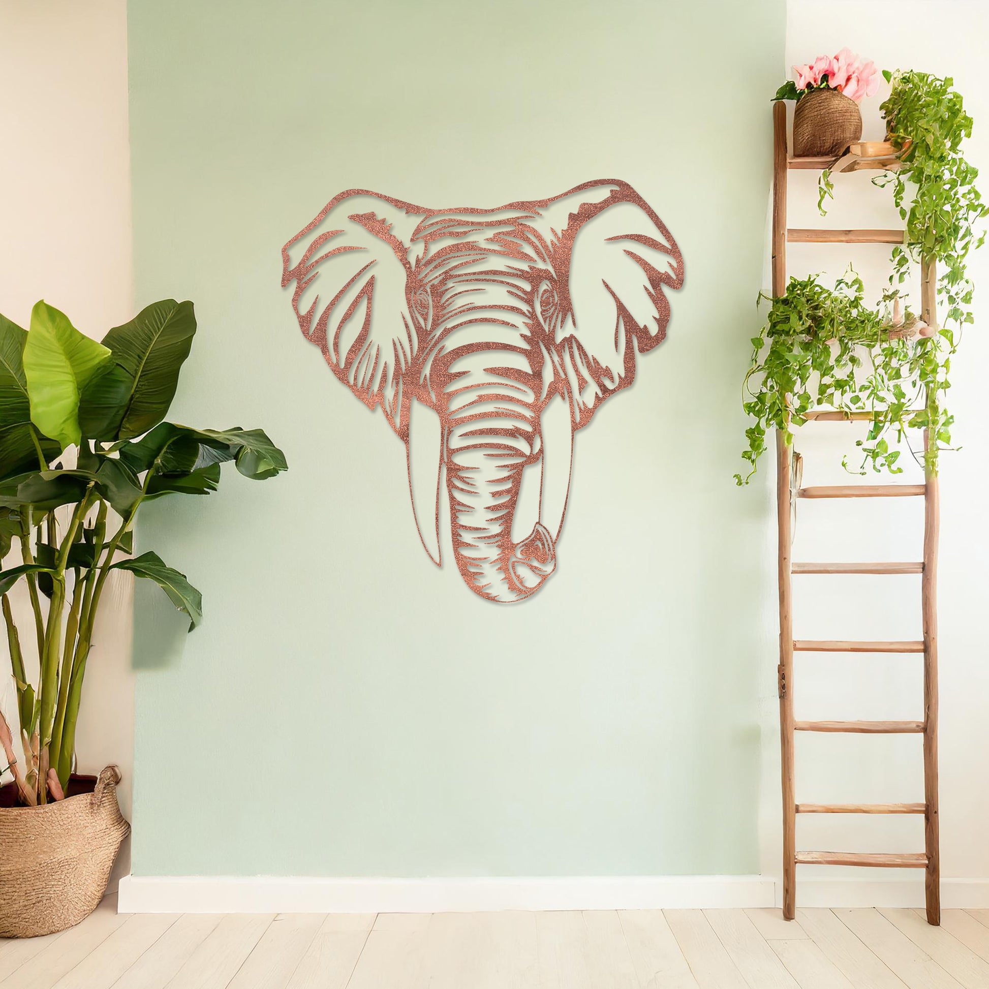 Wooden wall art featuring an intricately detailed elephant head design, displayed on a neutral wall within modern room decor, highlighting its bold and artistic craftsmanship.