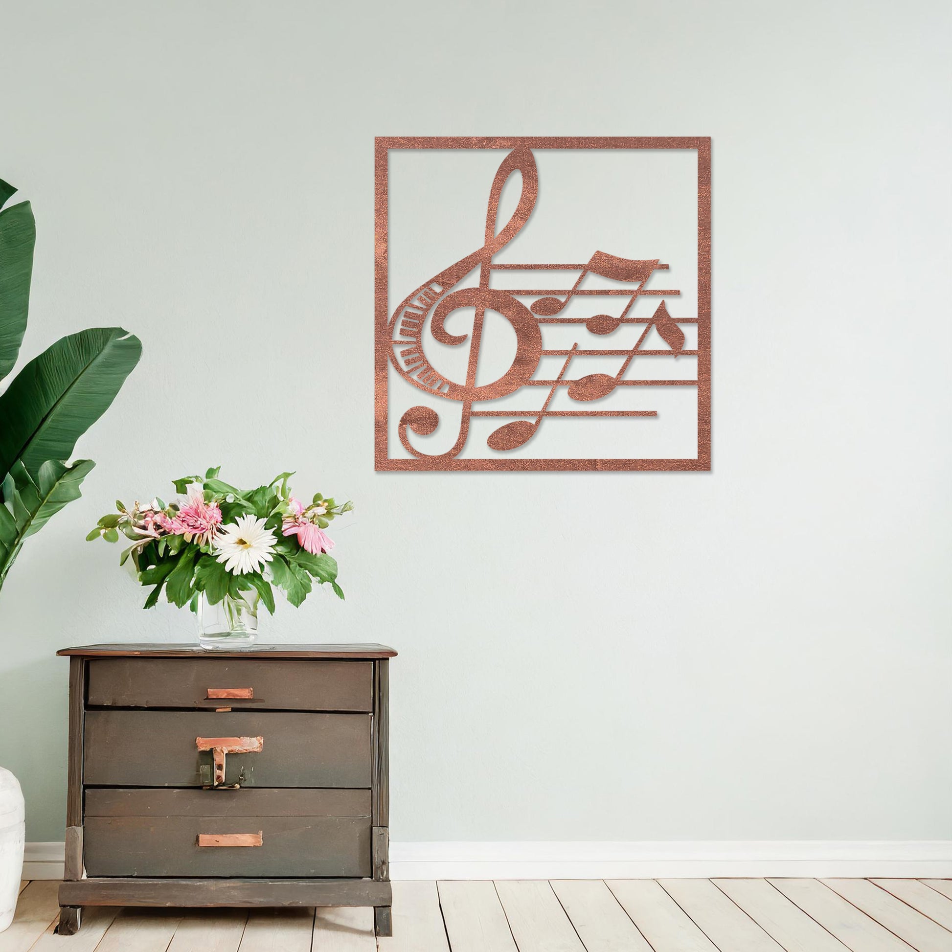Wooden wall art featuring a musical design with a treble clef, musical notes, and staff lines, displayed on a neutral wall within modern room decor, highlighting its artistic and creative craftsmanship.