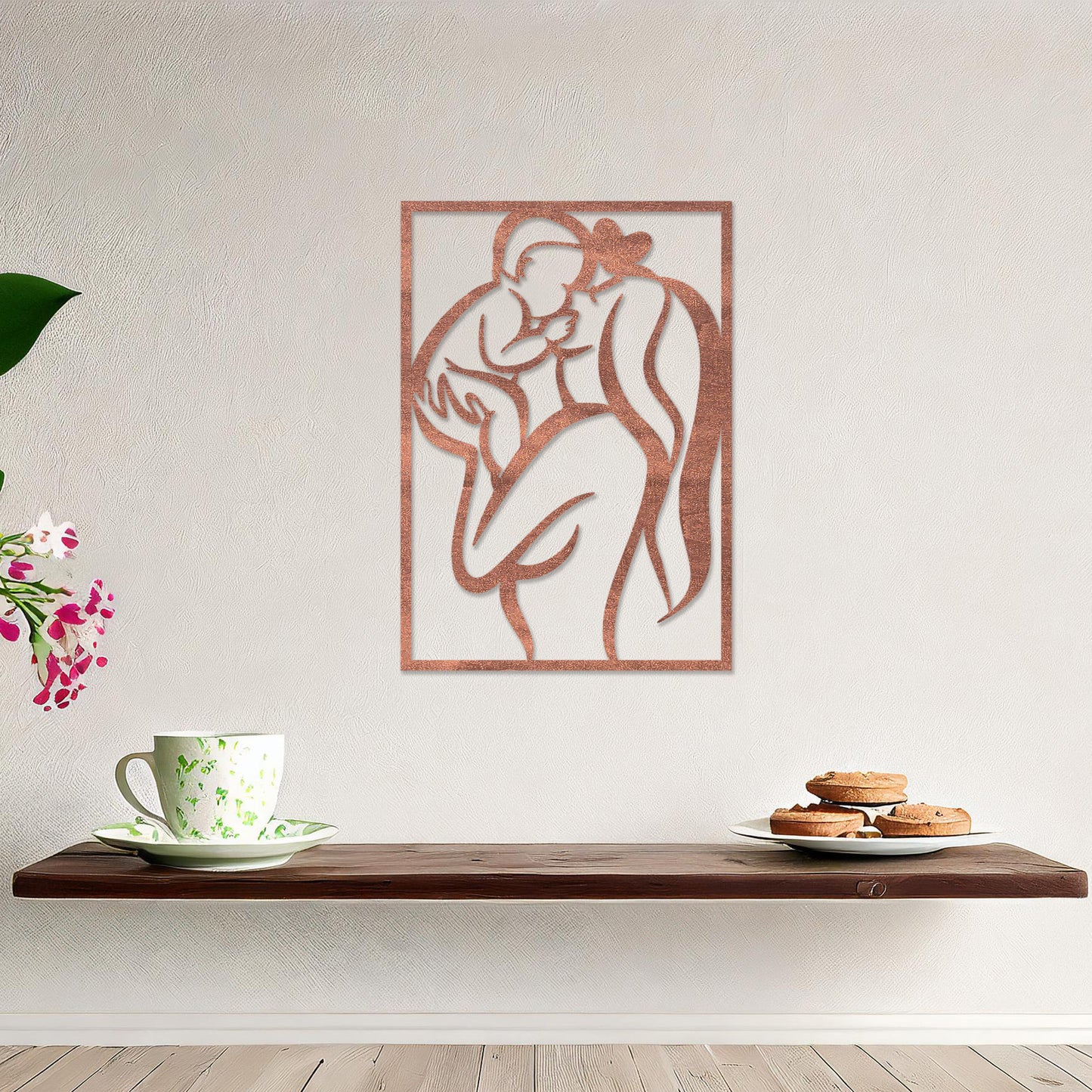 Wooden wall art featuring a rectangular design depicting a mother holding her baby in an abstract and heartfelt style. The artwork is displayed on a neutral wall within modern room decor, highlighting its emotional and artistic essence.
