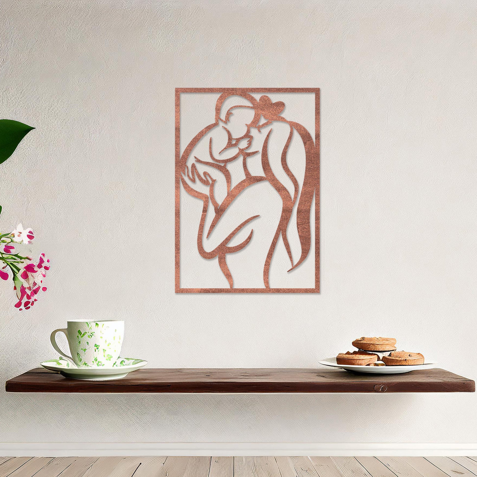 Wooden wall art featuring a rectangular design depicting a mother holding her baby in an abstract and heartfelt style. The artwork is displayed on a neutral wall within modern room decor, highlighting its emotional and artistic essence.