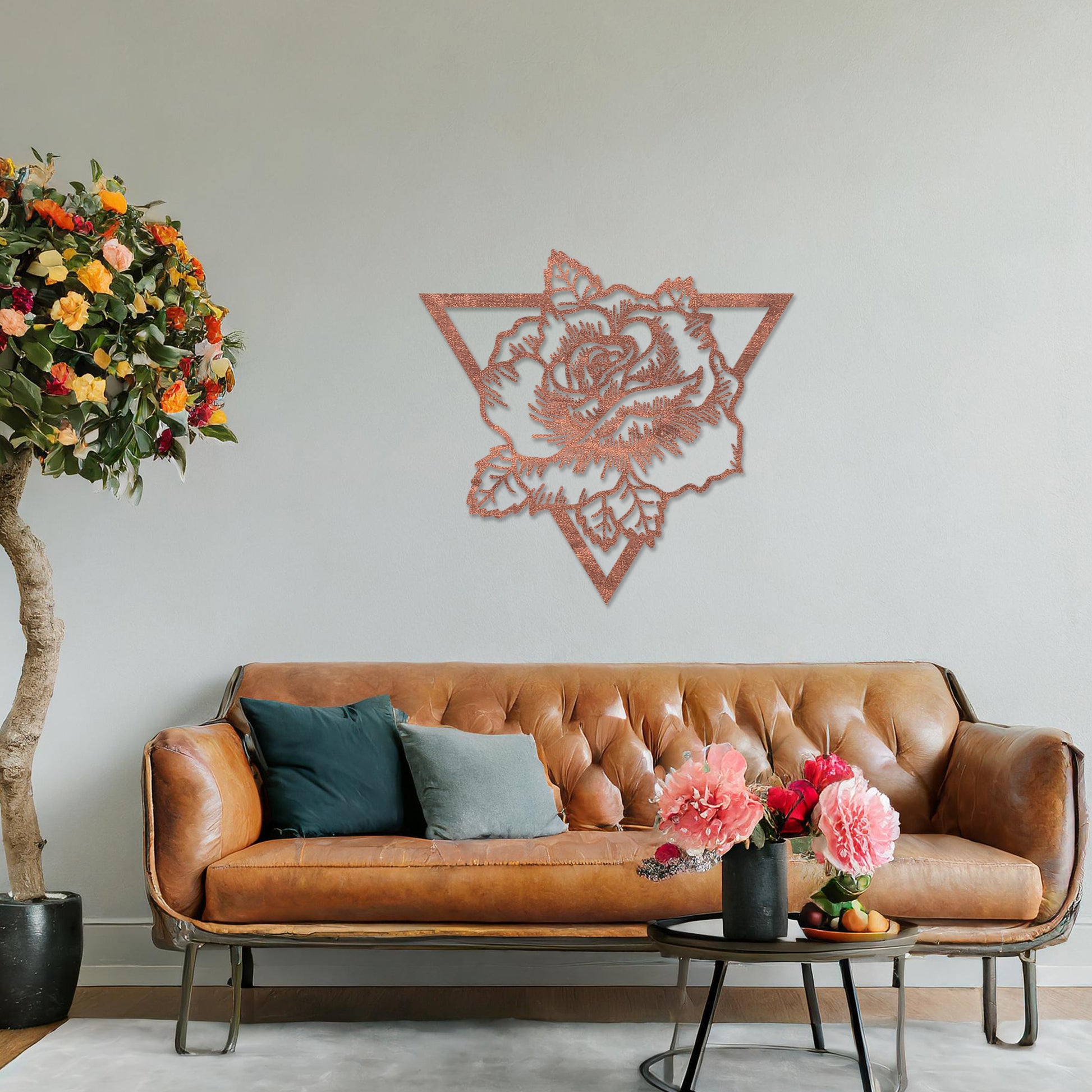 Wooden wall art featuring a rose design framed within a triangular outline, showcasing intricate detailing of petals and leaves. The artwork is displayed on a neutral wall within modern room decor, highlighting its elegant and bold aesthetic.
