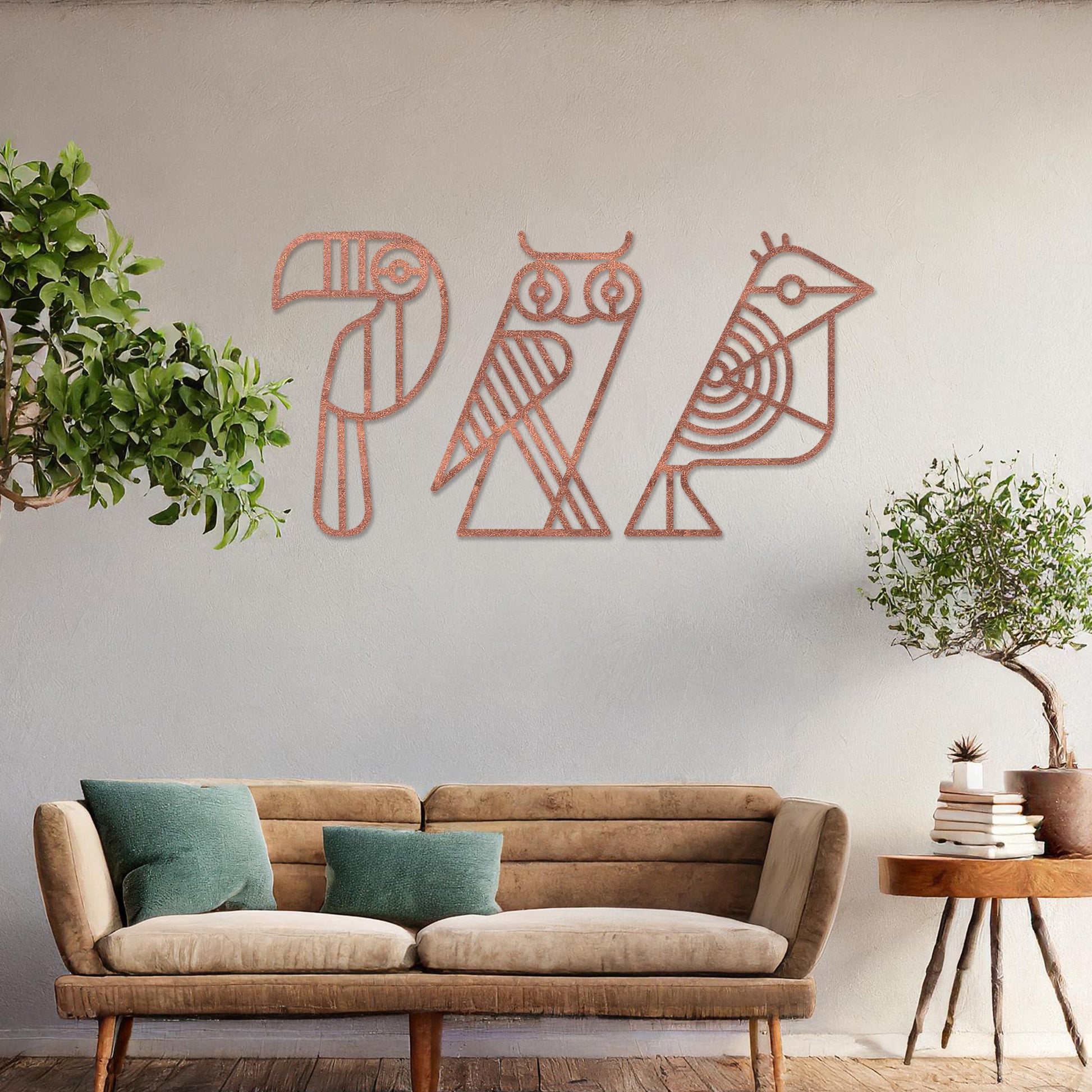 Wooden wall art featuring a trio of abstract geometric bird designs, including a toucan, an owl, and a sparrow. The artwork is displayed on a neutral wall within modern room decor, showcasing its playful and artistic charm.
