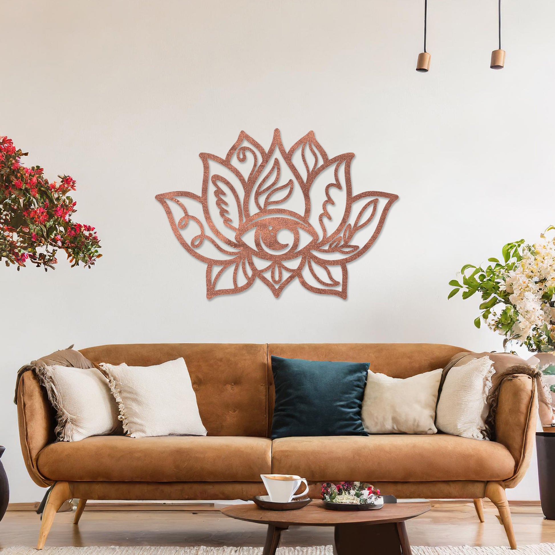 Wooden wall art featuring a lotus flower design with an eye motif at its centre and intricate detailing. The artwork is displayed on a neutral wall within modern room decor, highlighting its symbolic and artistic appeal.