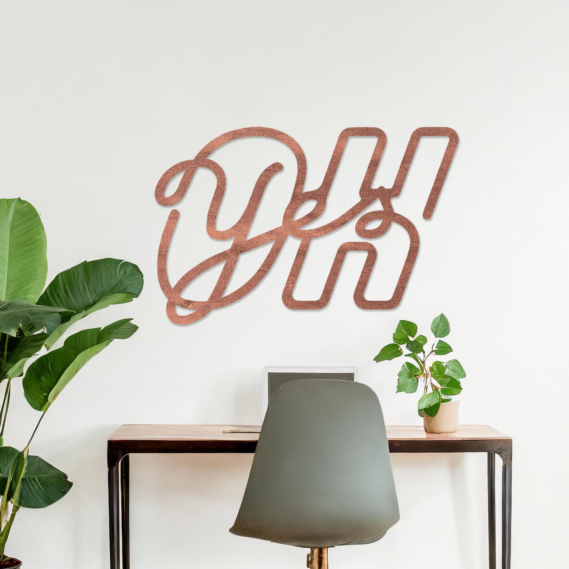 Wall art featuring the phrase "Oh Yes" in an elegant, flowing script combined with bold, block-style letters. The piece is displayed on a neutral wall within modern decor, adding a creative and playful touch to the space.