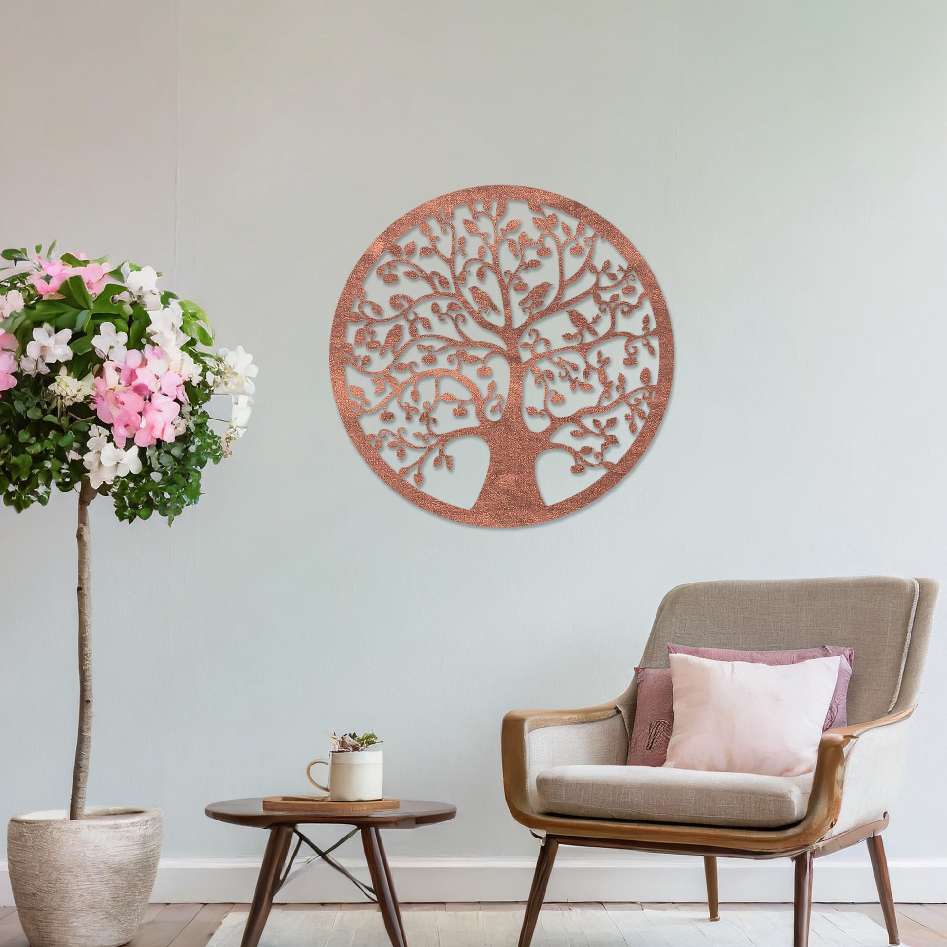 Wooden wall art featuring a circular tree design with intricate branches, leaves, and birds, displayed on a neutral wall within modern room decor, highlighting its detailed and nature-inspired craftsmanship.