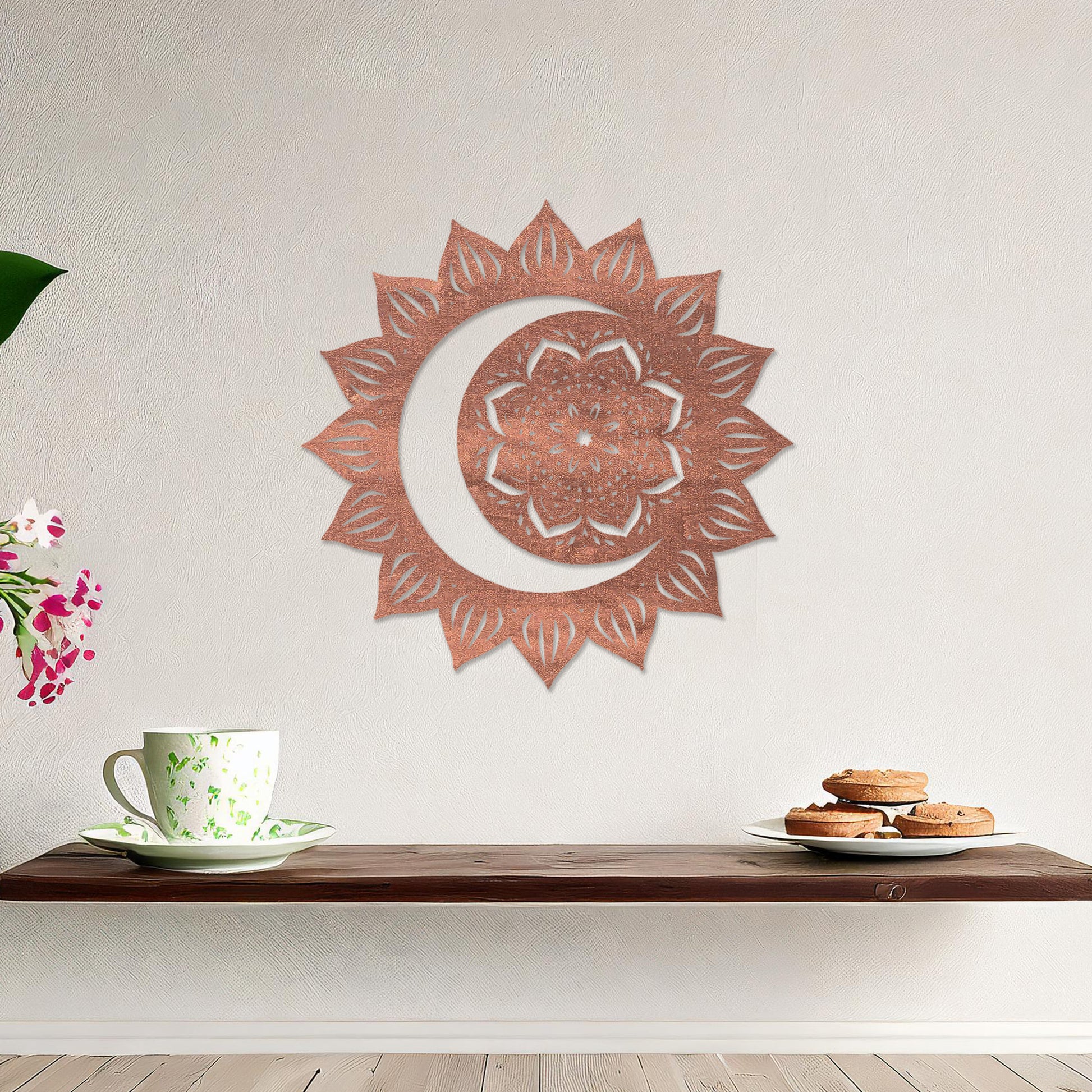 Wall art featuring a crescent moon surrounded by a mandala-inspired floral design with intricate details. The piece is displayed on a neutral wall within modern decor, adding a serene and decorative touch to the space.