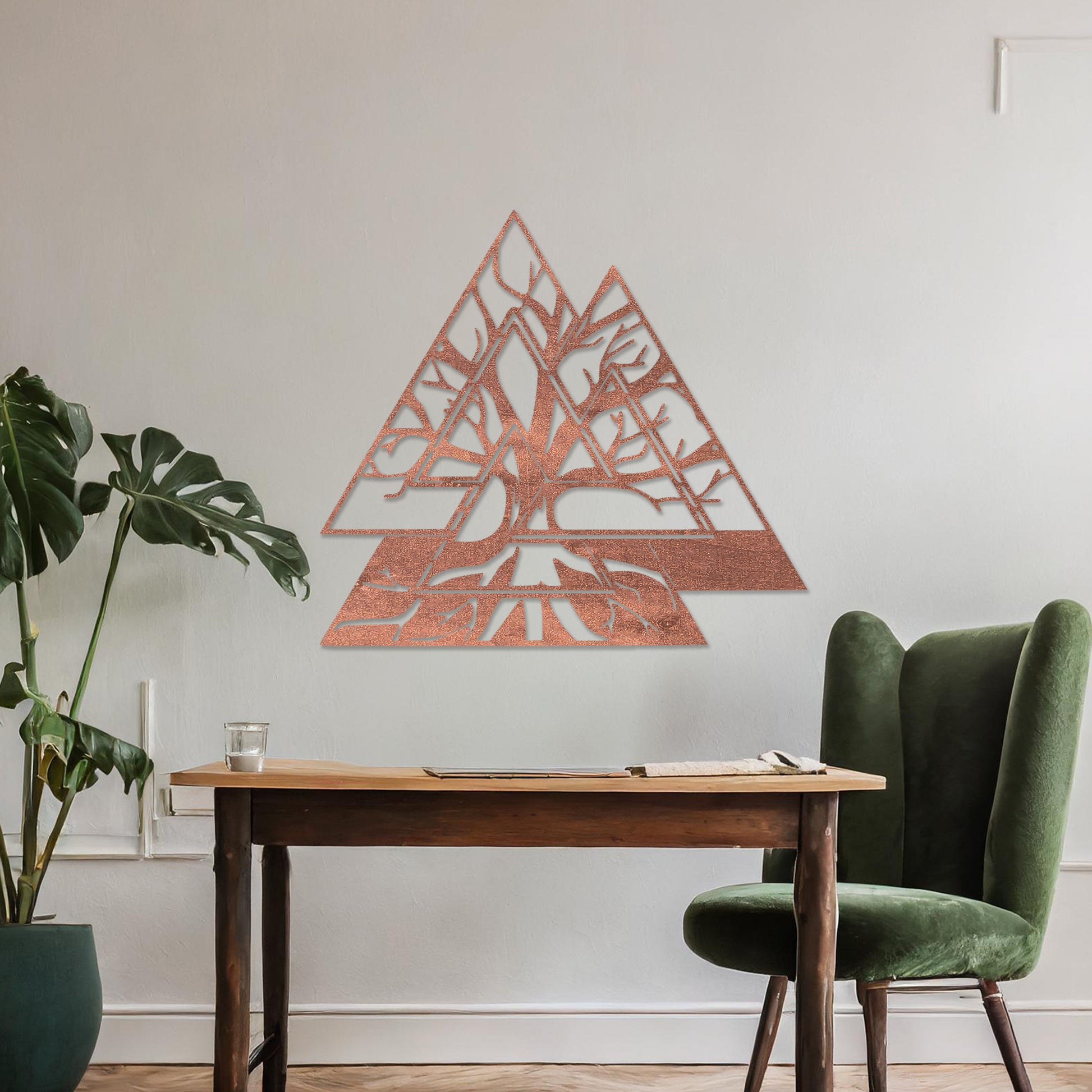 Wooden wall art design featuring a geometric triangular shape with intricate tree branches interwoven inside, placed on a neutral wall within modern room decor. The design combines nature and geometry for a contemporary, artistic expression.