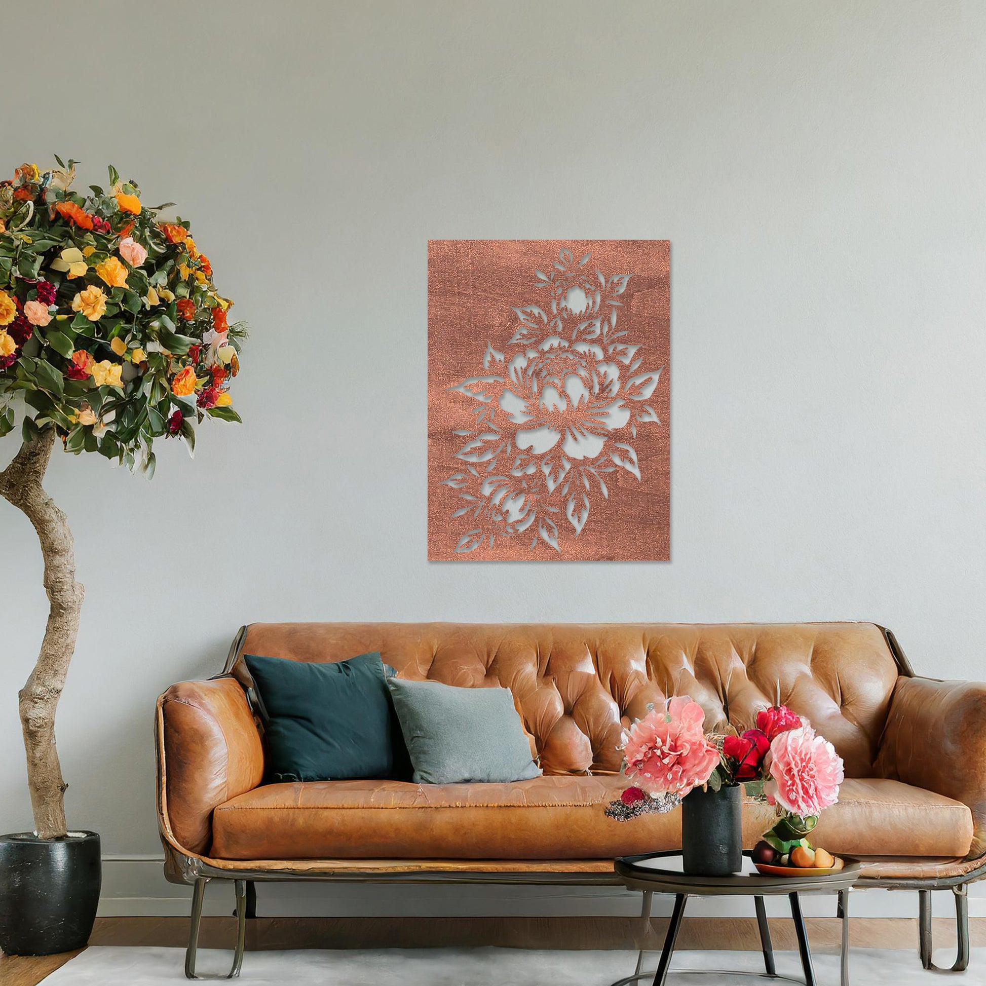 Wall art featuring a detailed floral design with blooming peonies and intricate leaves. The piece is mounted on a neutral wall within modern room decor, adding a touch of natural elegance to the space.