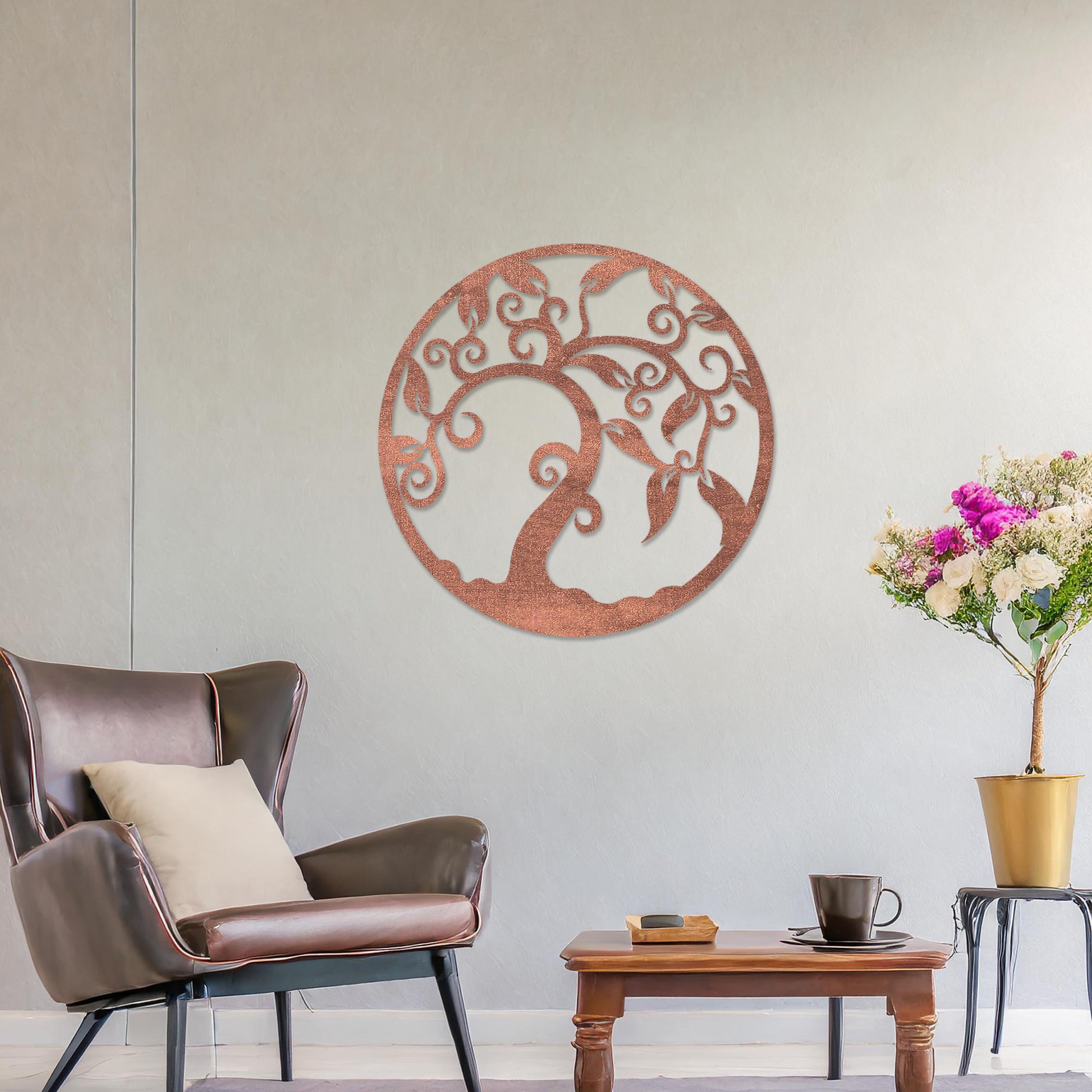 Wooden wall art design featuring a swirling tree with curved branches and leaves, framed in a circular shape, placed on a neutral wall within modern room decor. The design highlights elegant, flowing forms for a peaceful, organic look.