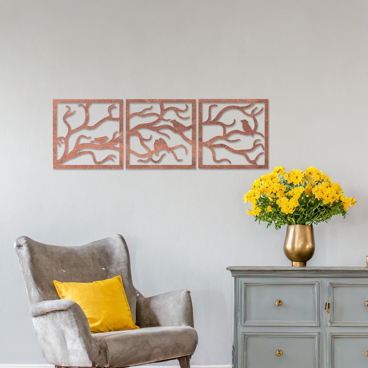 A three-panel wall art showcasing a design of birds perched on delicate tree branches. The intricate artwork is displayed on a neutral wall in a modern room, enhancing the natural and elegant ambiance of the decor.