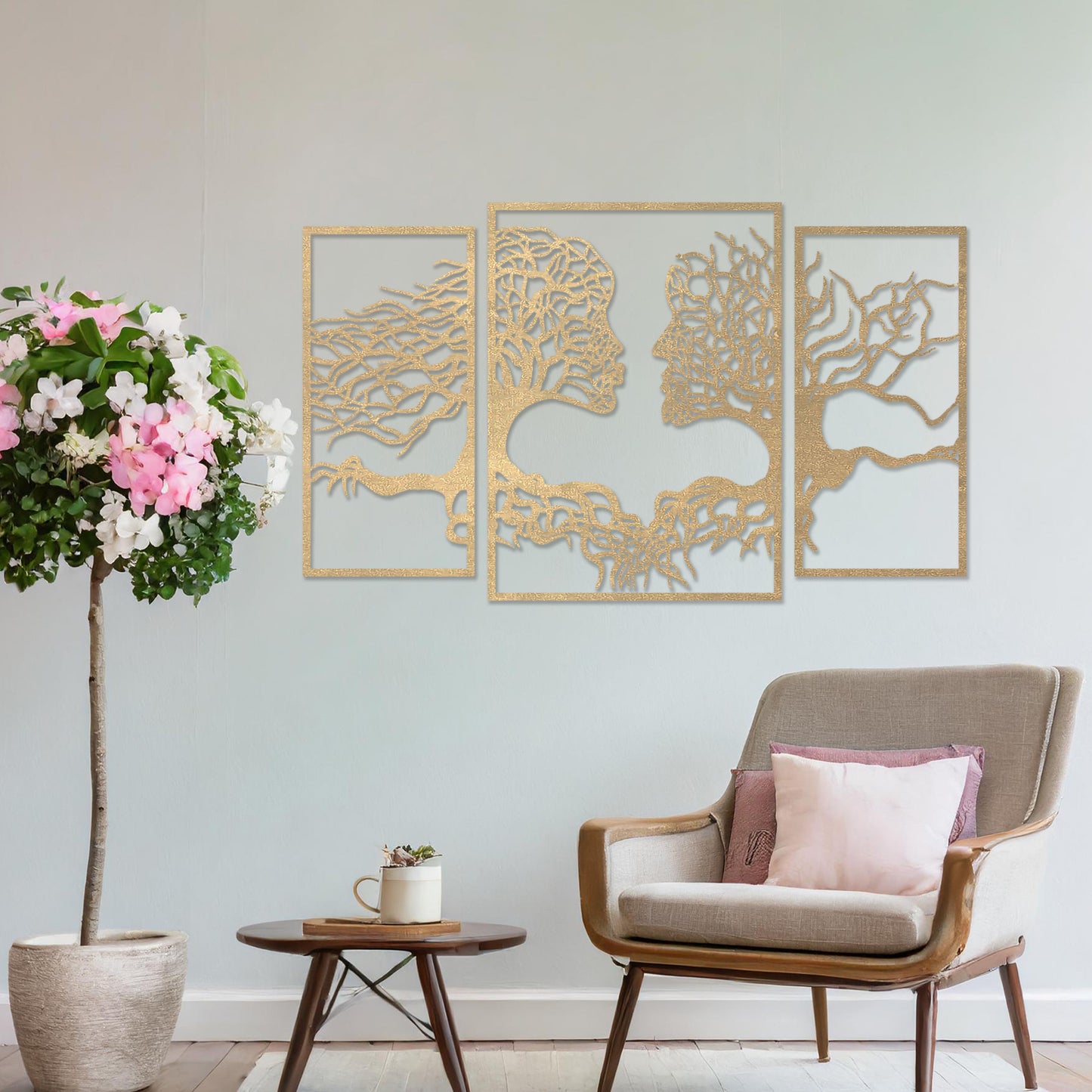 Wooden wall art showcasing a striking design of intertwined tree branches forming human profiles, placed on a neutral wall within modern room decor, highlighting its artistic and symbolic craftsmanship.