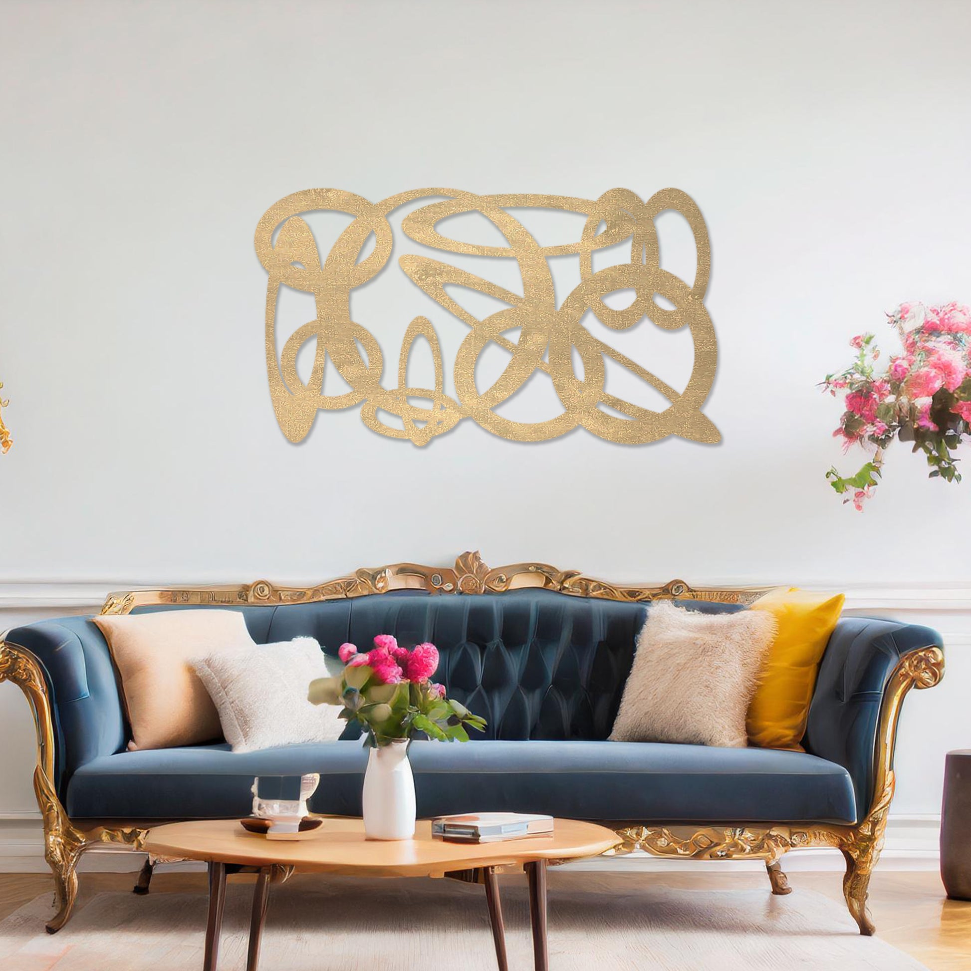 Wooden wall art design featuring an abstract composition of interwoven loops and shapes, placed on a neutral wall within modern room decor. The design combines flowing lines and organic forms for a contemporary, artistic feel.