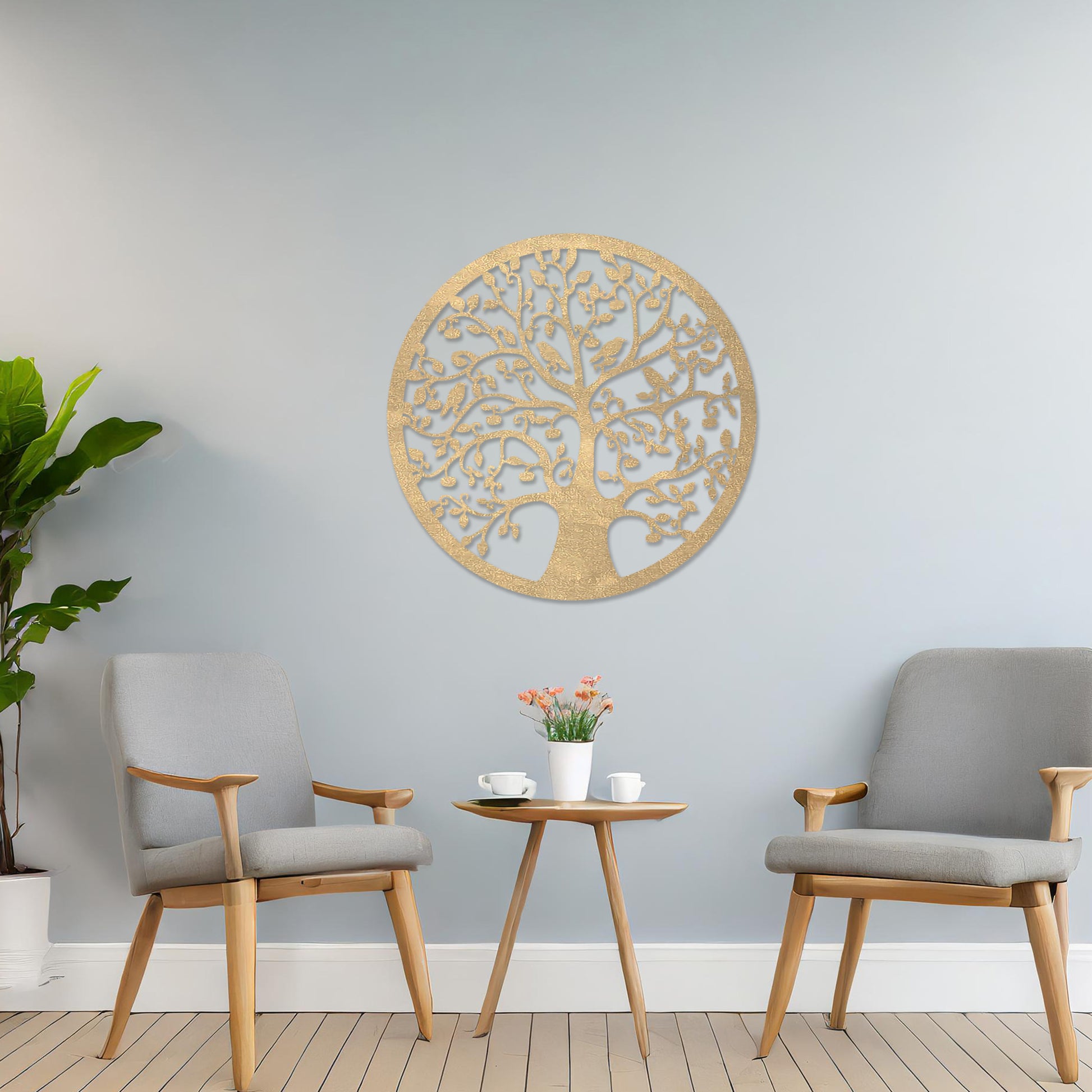Wooden wall art featuring a circular tree design with intricate branches, leaves, and birds, displayed on a neutral wall within modern room decor, highlighting its detailed and nature-inspired craftsmanship.