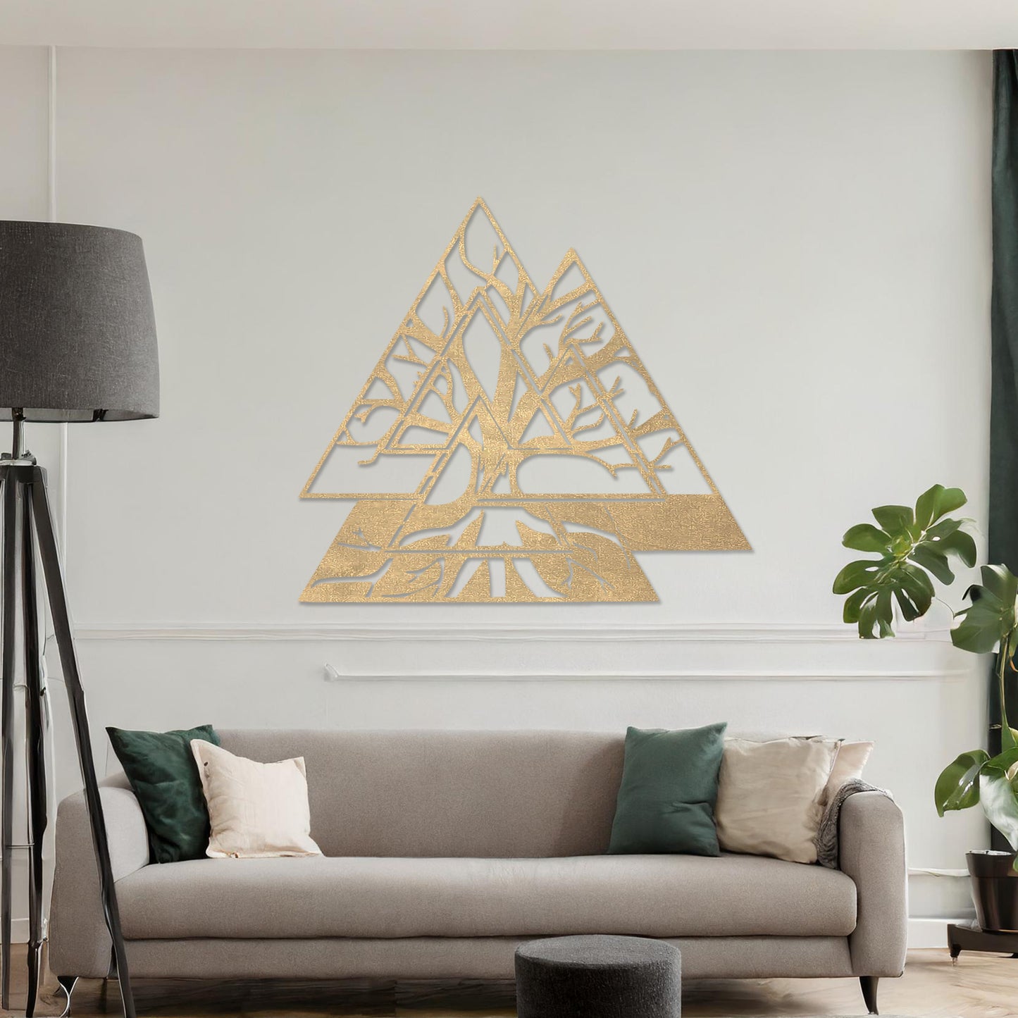 Wooden wall art design featuring a geometric triangular shape with intricate tree branches interwoven inside, placed on a neutral wall within modern room decor. The design combines nature and geometry for a contemporary, artistic expression.