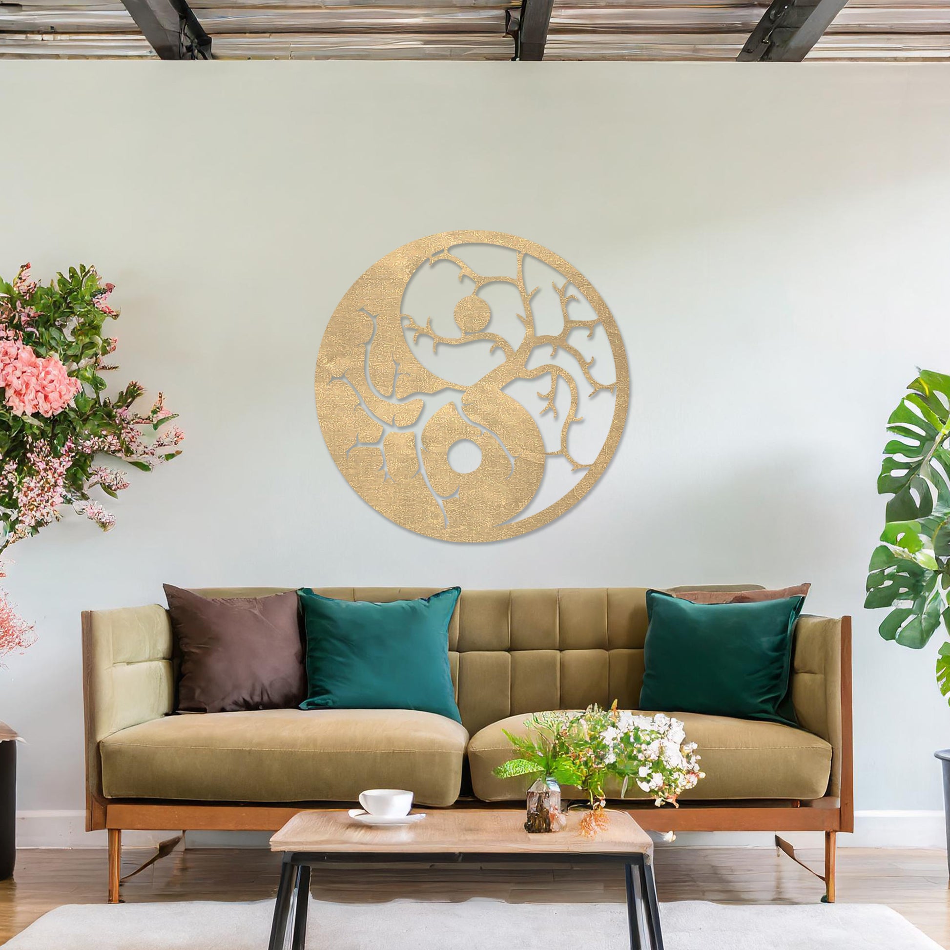 Wall art featuring a yin-yang design with tree branches integrated into each half, symbolising balance and harmony. The piece is displayed on a neutral wall within modern decor, adding a meaningful and artistic focal point to the space.
