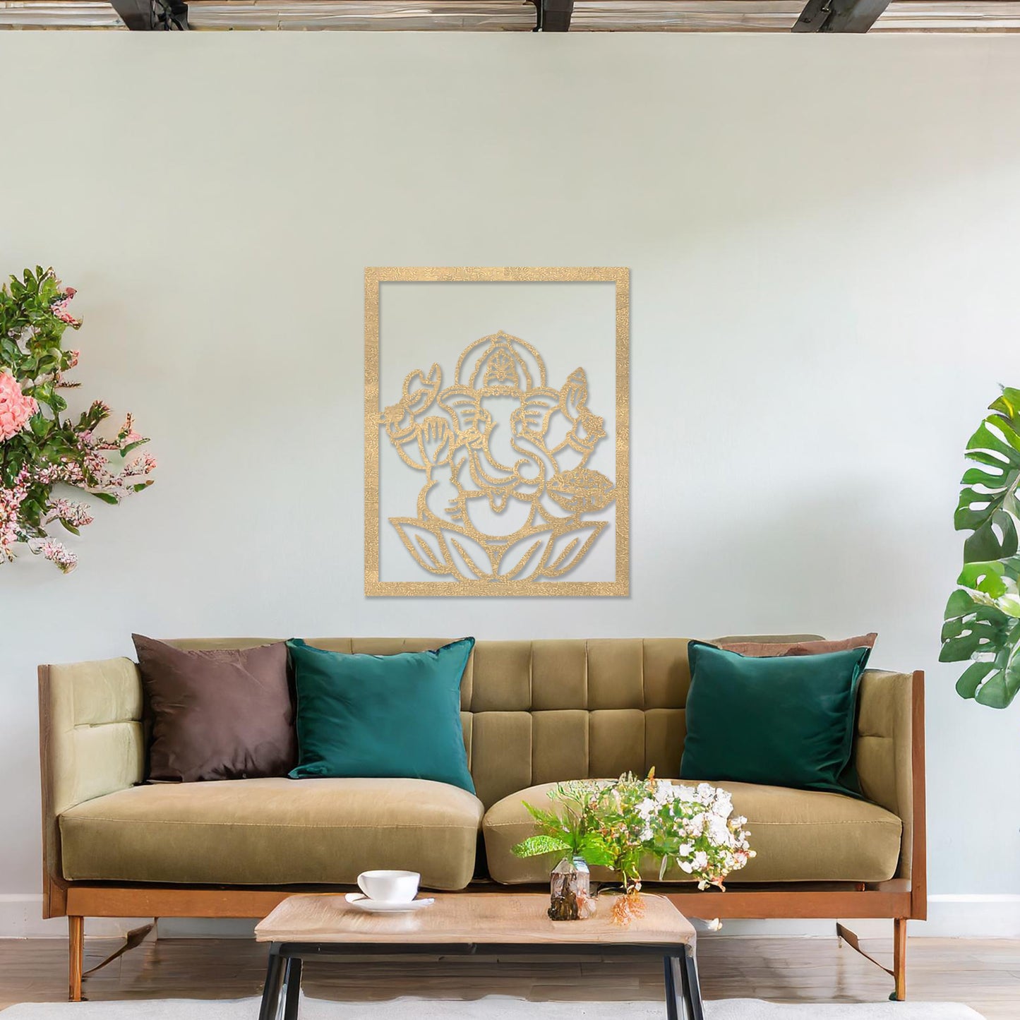 Wooden wall art featuring a framed design of Lord Ganesha sitting on a lotus flower with intricate details. The artwork is displayed on a neutral wall within modern room decor, highlighting its cultural and artistic elegance.