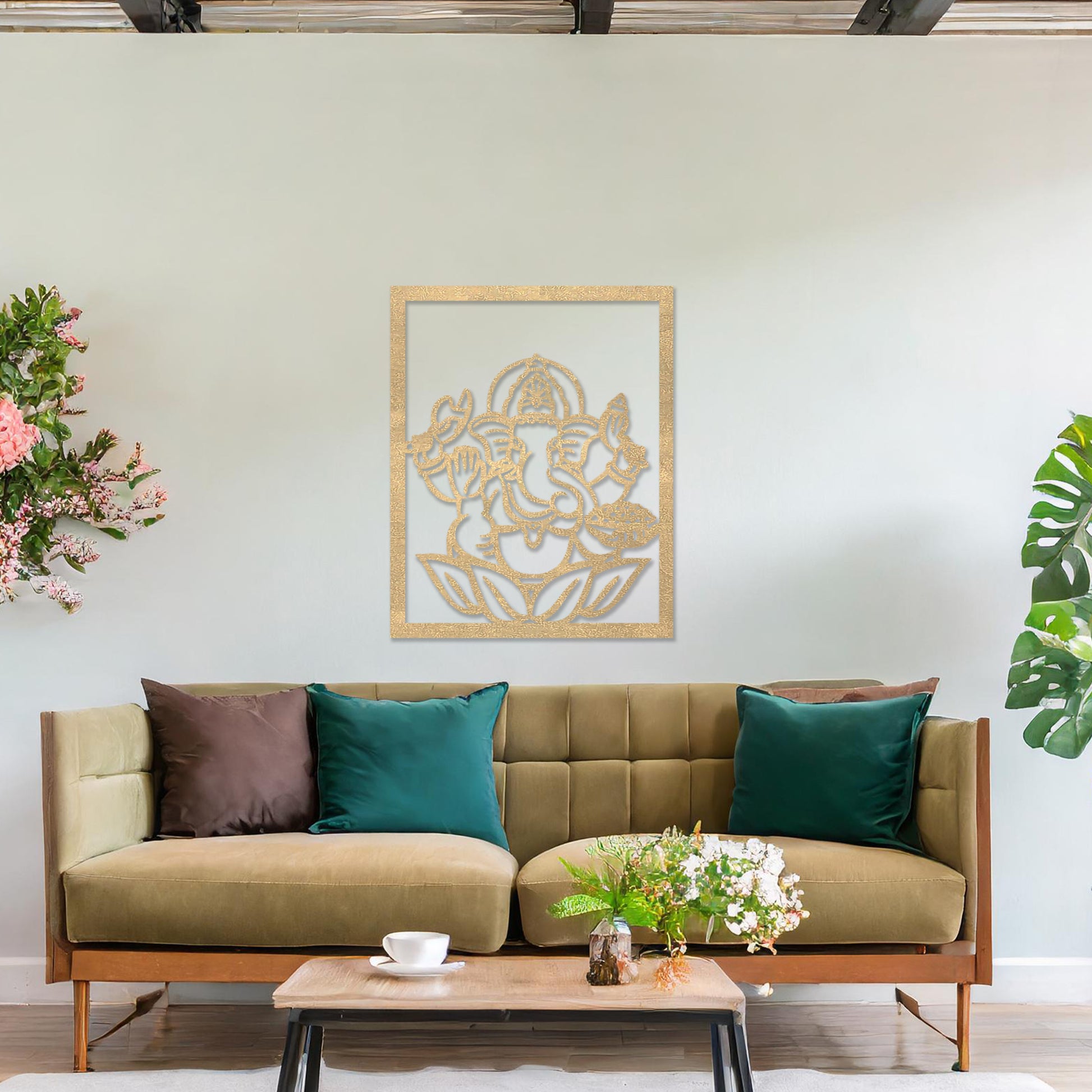 Wooden wall art featuring a framed design of Lord Ganesha sitting on a lotus flower with intricate details. The artwork is displayed on a neutral wall within modern room decor, highlighting its cultural and artistic elegance.