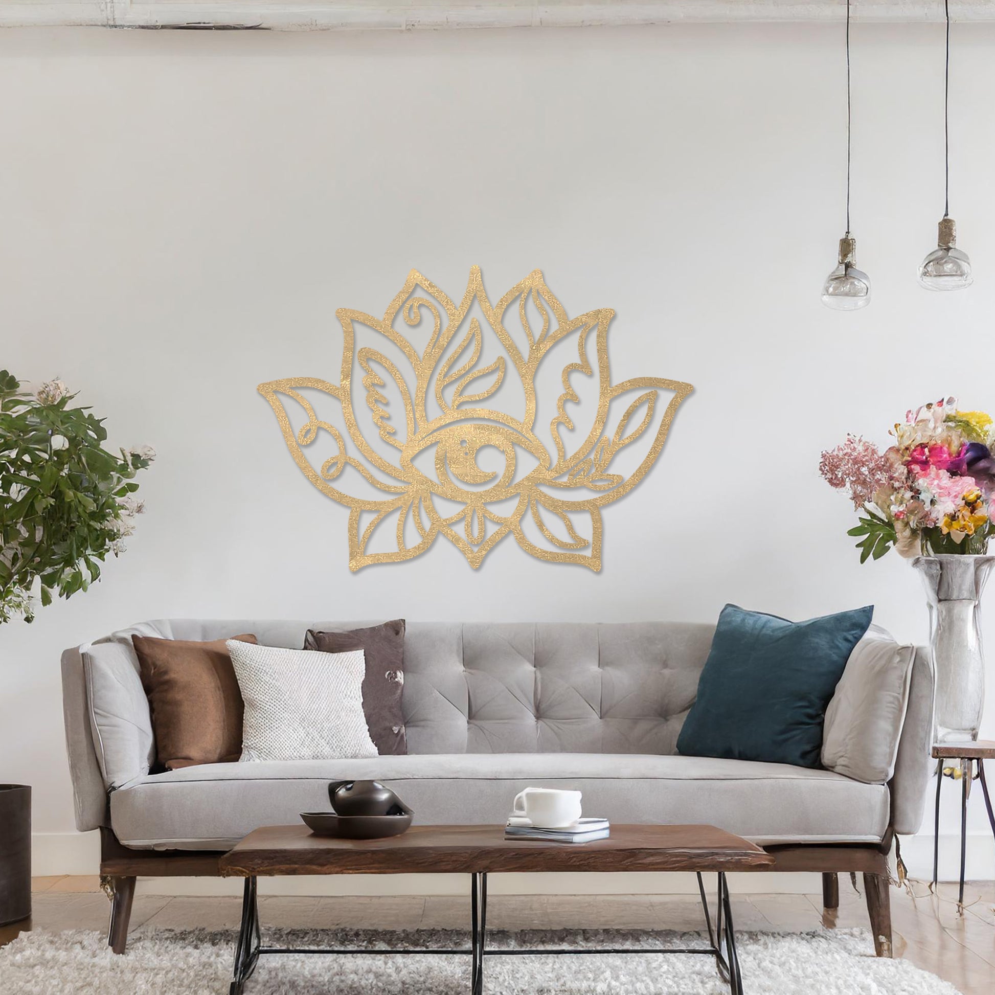 Wooden wall art featuring a lotus flower design with an eye motif at its centre and intricate detailing. The artwork is displayed on a neutral wall within modern room decor, highlighting its symbolic and artistic appeal.