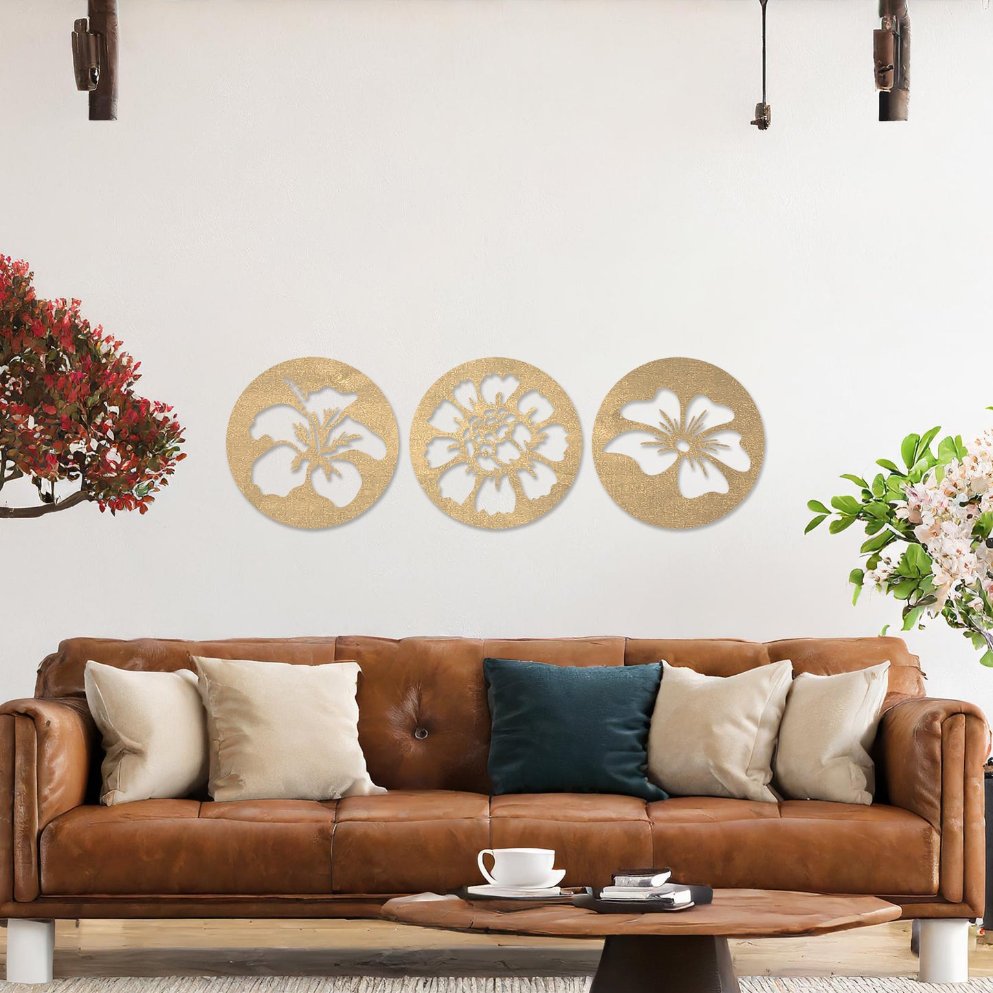 Wall art featuring a set of three circular panels, each showcasing a distinct floral design with intricate cut-out details. The artwork is displayed on a neutral wall within modern decor, adding a charming and decorative touch to the space.