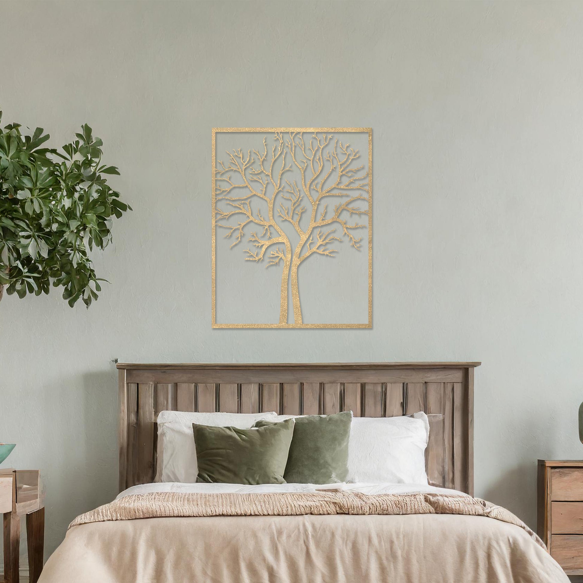 Wooden wall art featuring a minimalist tree design with bare branches, displayed on a neutral wall within modern room decor, highlighting its elegant and natural craftsmanship.